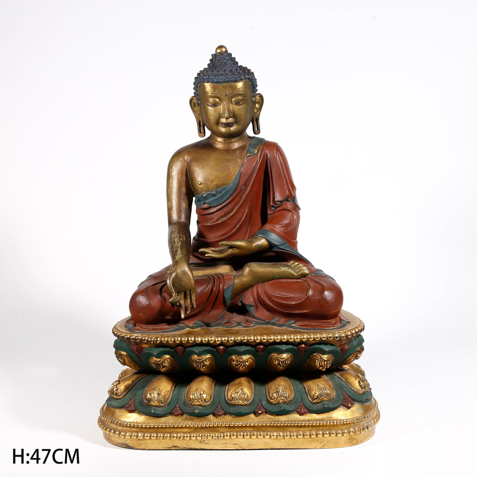 A PAINTED GILT BRONZE SAKYAMUNI STATUE: Painted Gilt Bronze Sakyamuni Statue