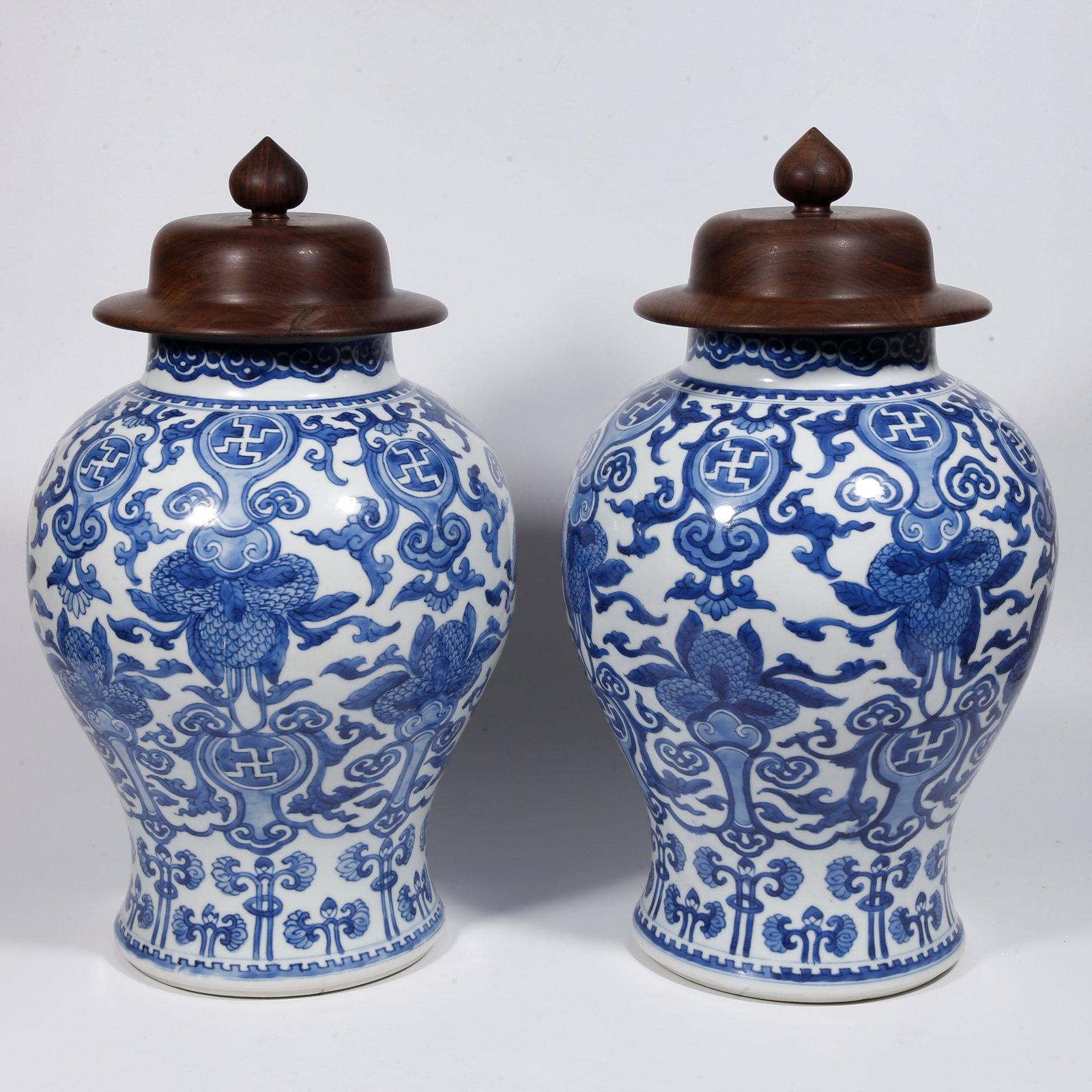 A PAIR OF BLUE AND WHITE JARS WITH AUSPICIOUS FRUIT MOTIFS (1 of 11)