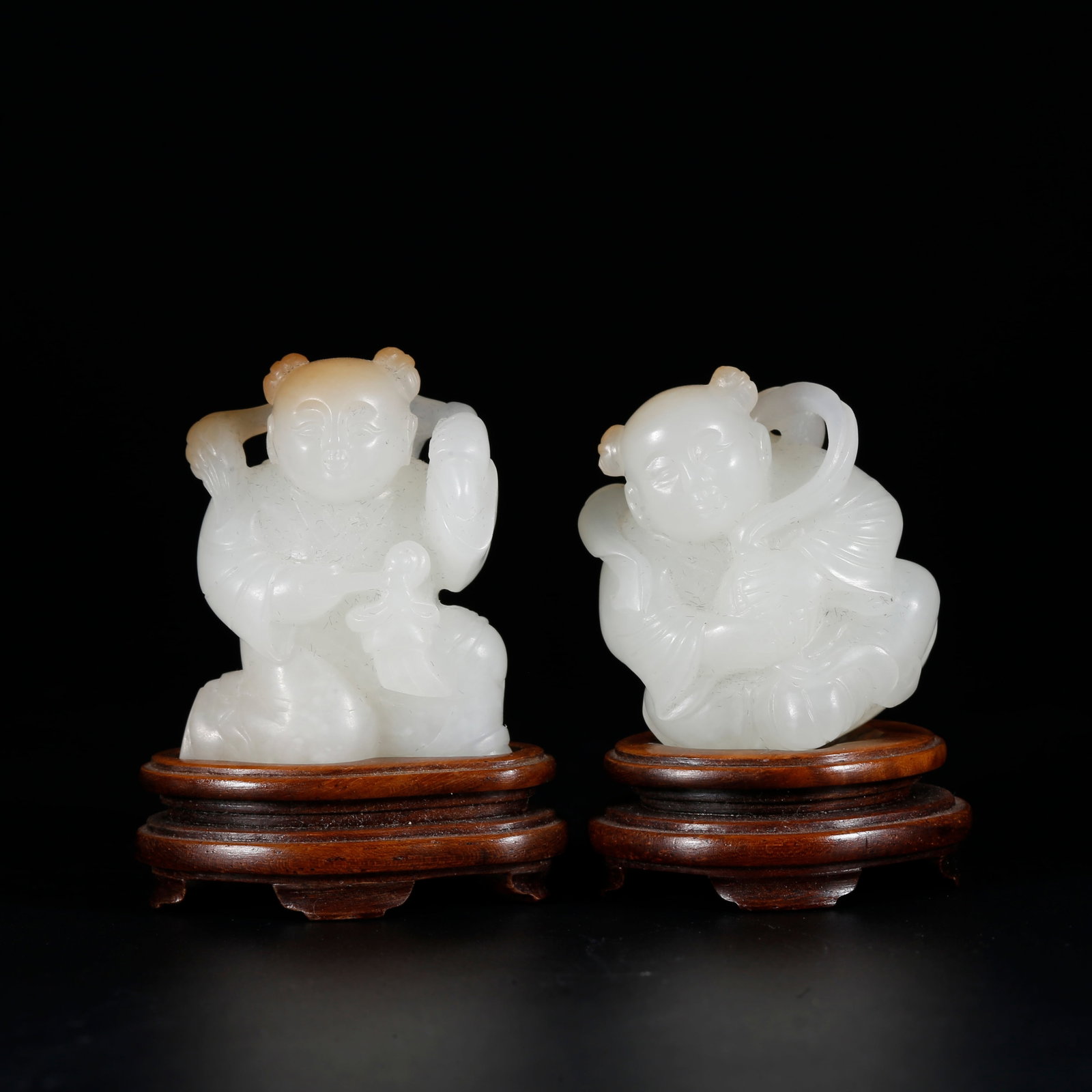 A PAIR OF HETIAN JADE STATUES OF BOY AND GIRL (1 of 10)