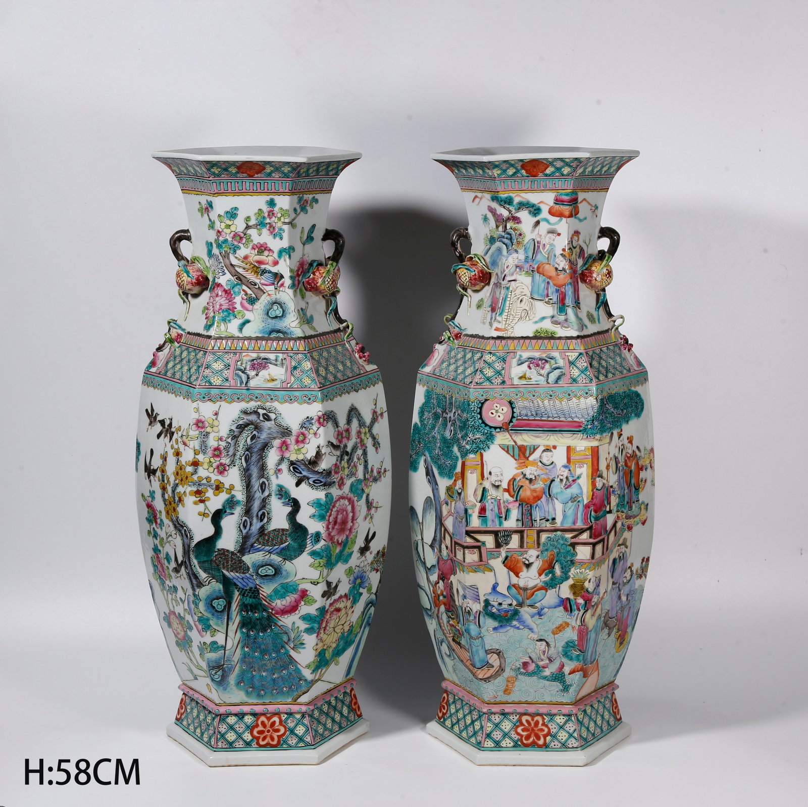 A PAIR OF HEXAGONAL FAMILLE ROSE VASES WITH FIGURE STORY PATTERN: Pair of Hexagonal Famille Rose Vases with Figure Story Pattern