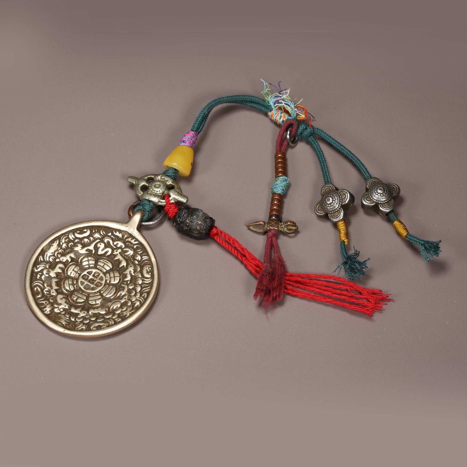 A BRONZE NINE-PALACE EIGHT-TRIGRAMS PLAQUE: Bronze Nine-Palace Eight-Trigrams Plaque
