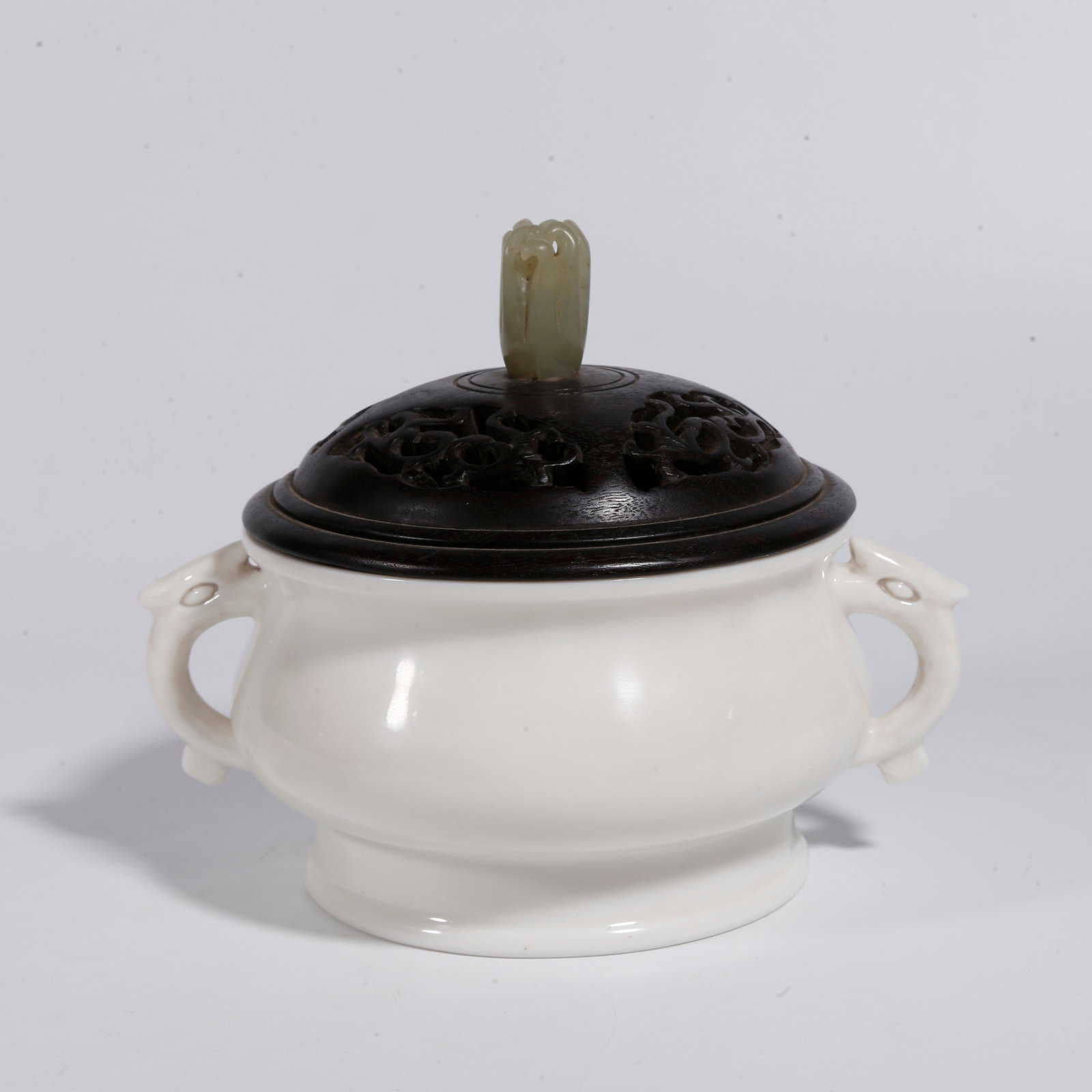 A DEHUA WHITE PORCELAIN INCENSE BURNER WITH DOUBLE EARS: Dehua White Porcelain Incense Burner with Double Ears