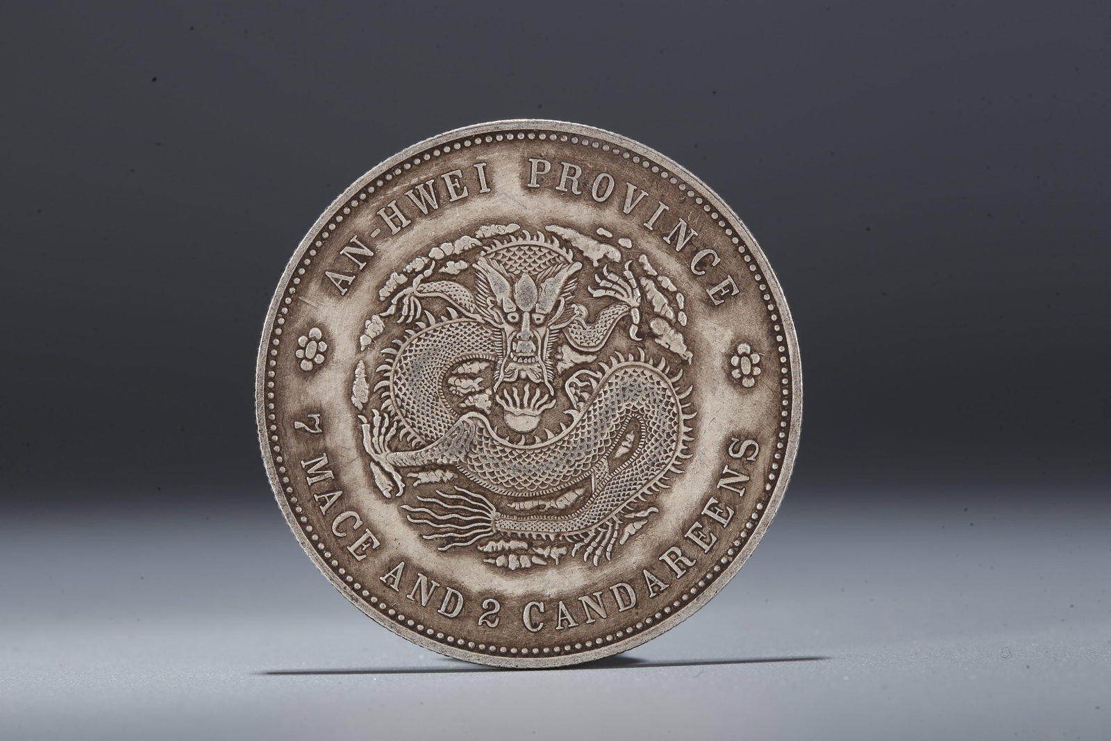 A SILVER DOLLAR COIN - 3
