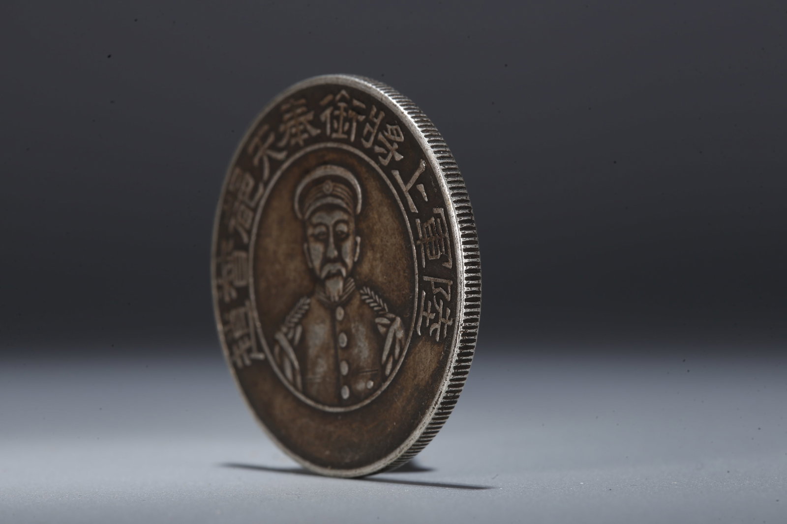 A SILVER DOLLAR COIN - 2