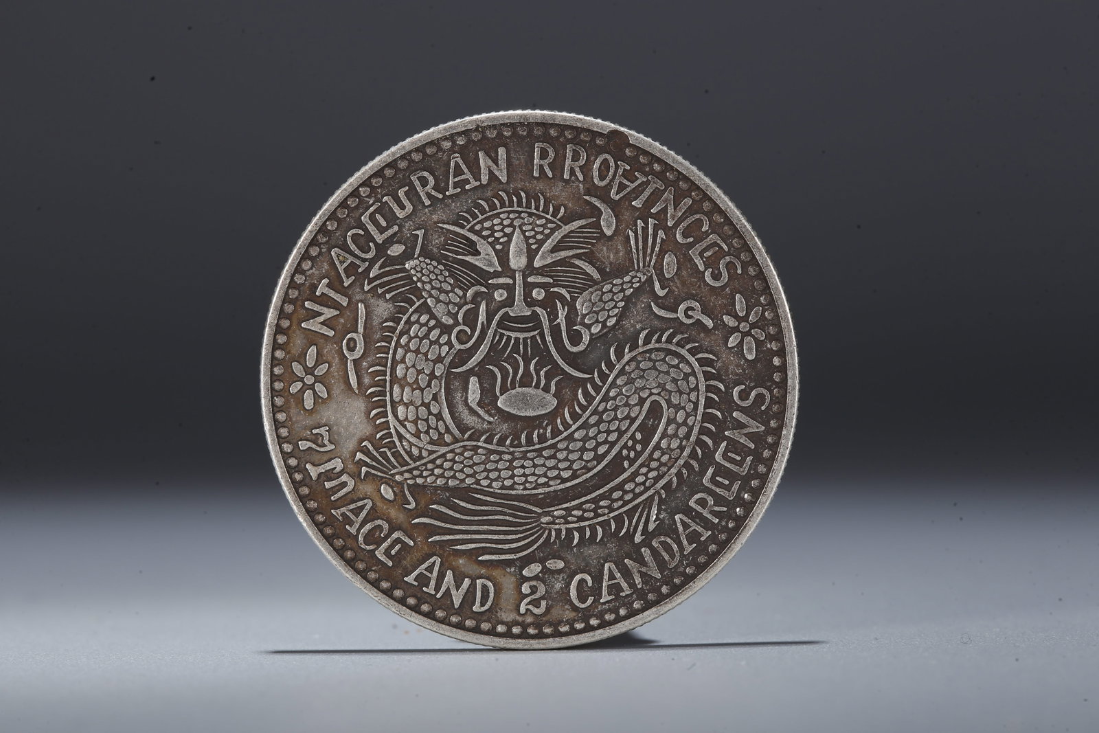 A SILVER DOLLAR COIN - 3