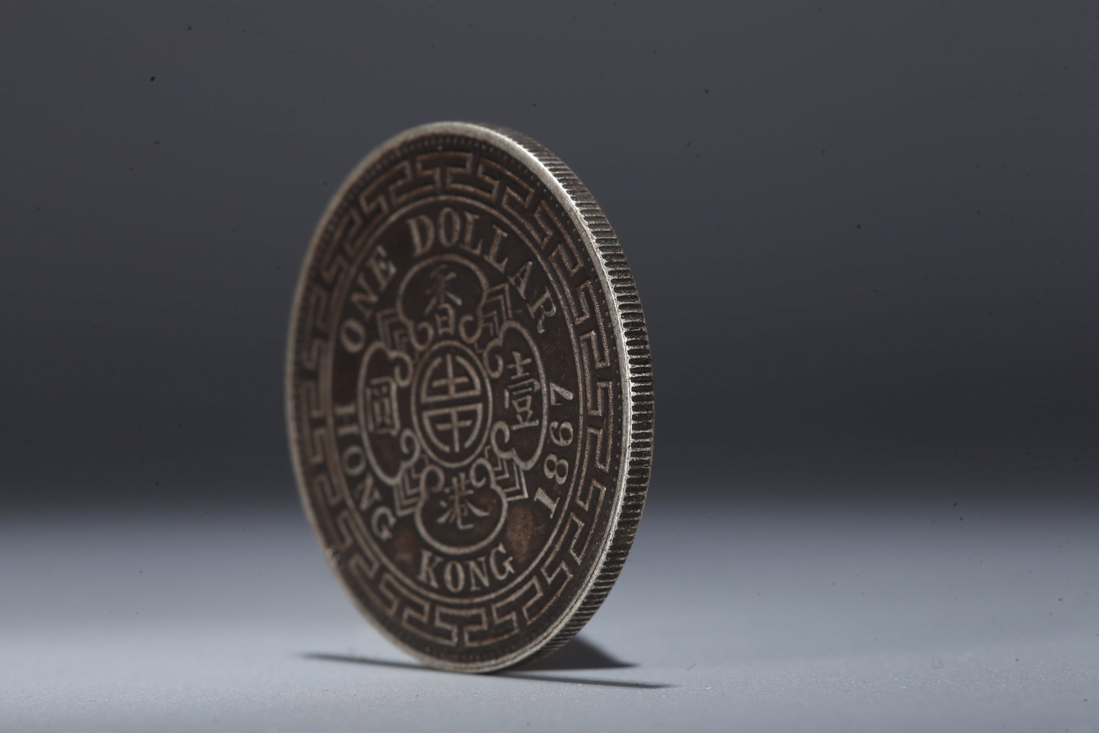 A SILVER DOLLAR COIN - 2