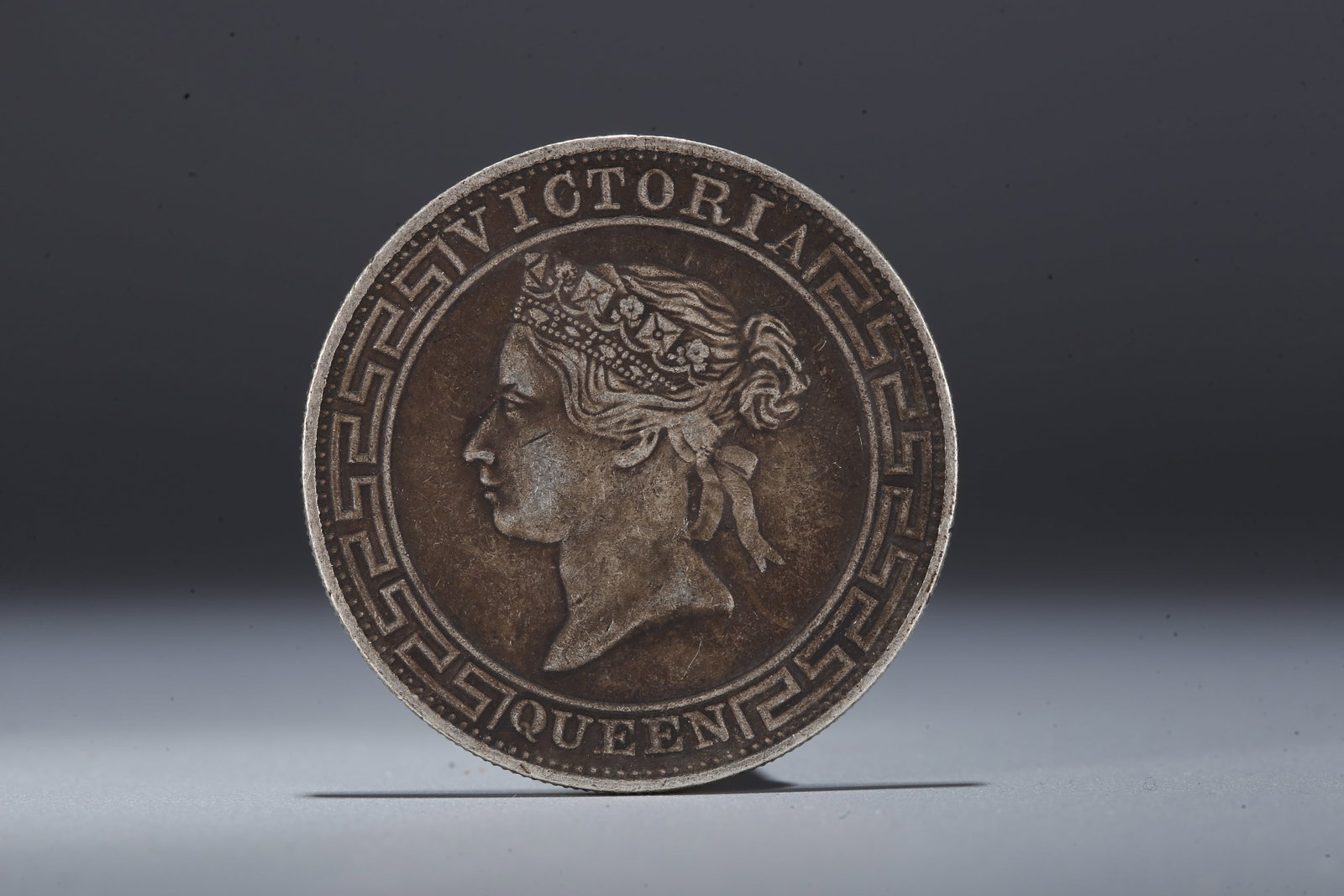 A SILVER DOLLAR COIN - 3