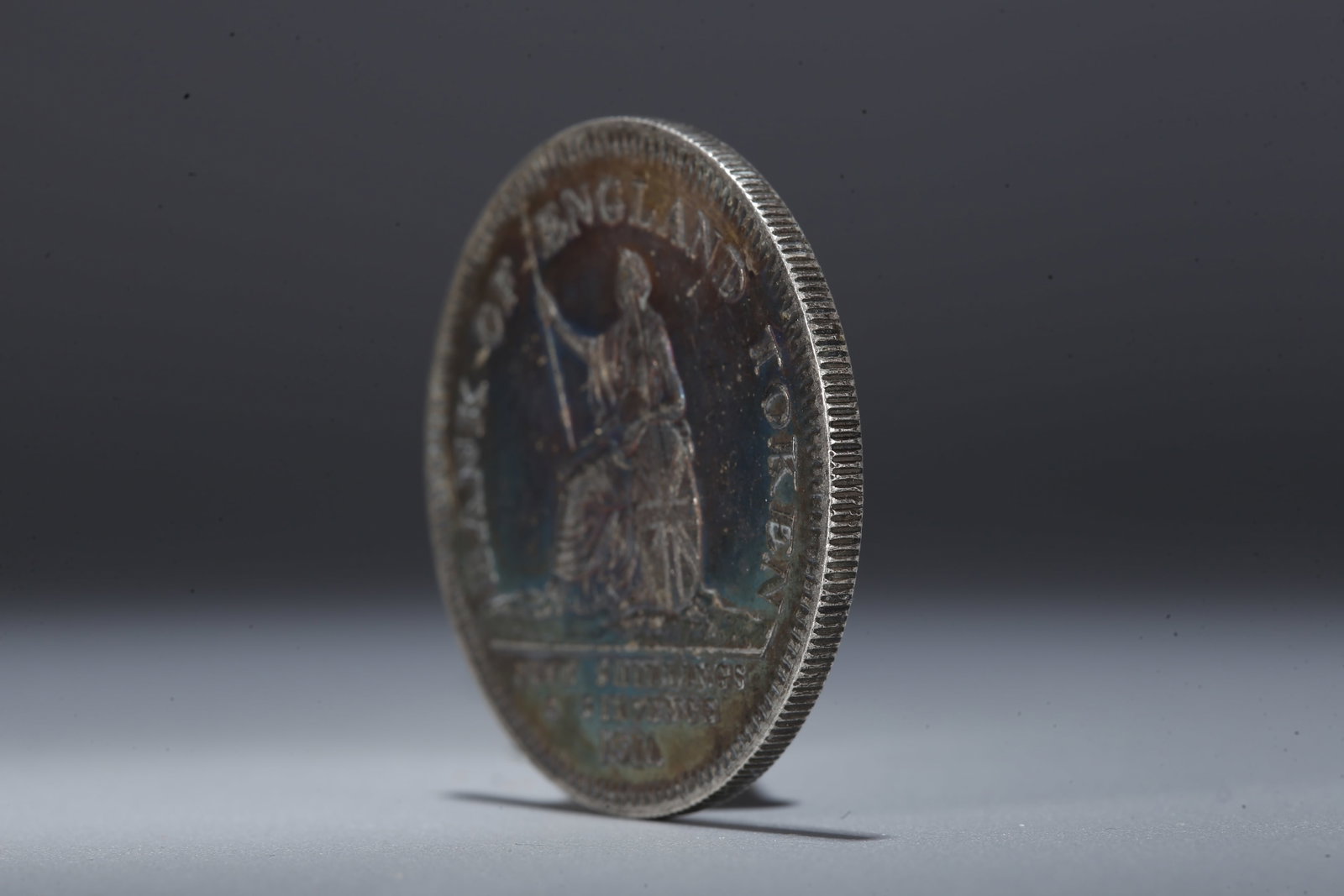 A SILVER DOLLAR COIN - 2