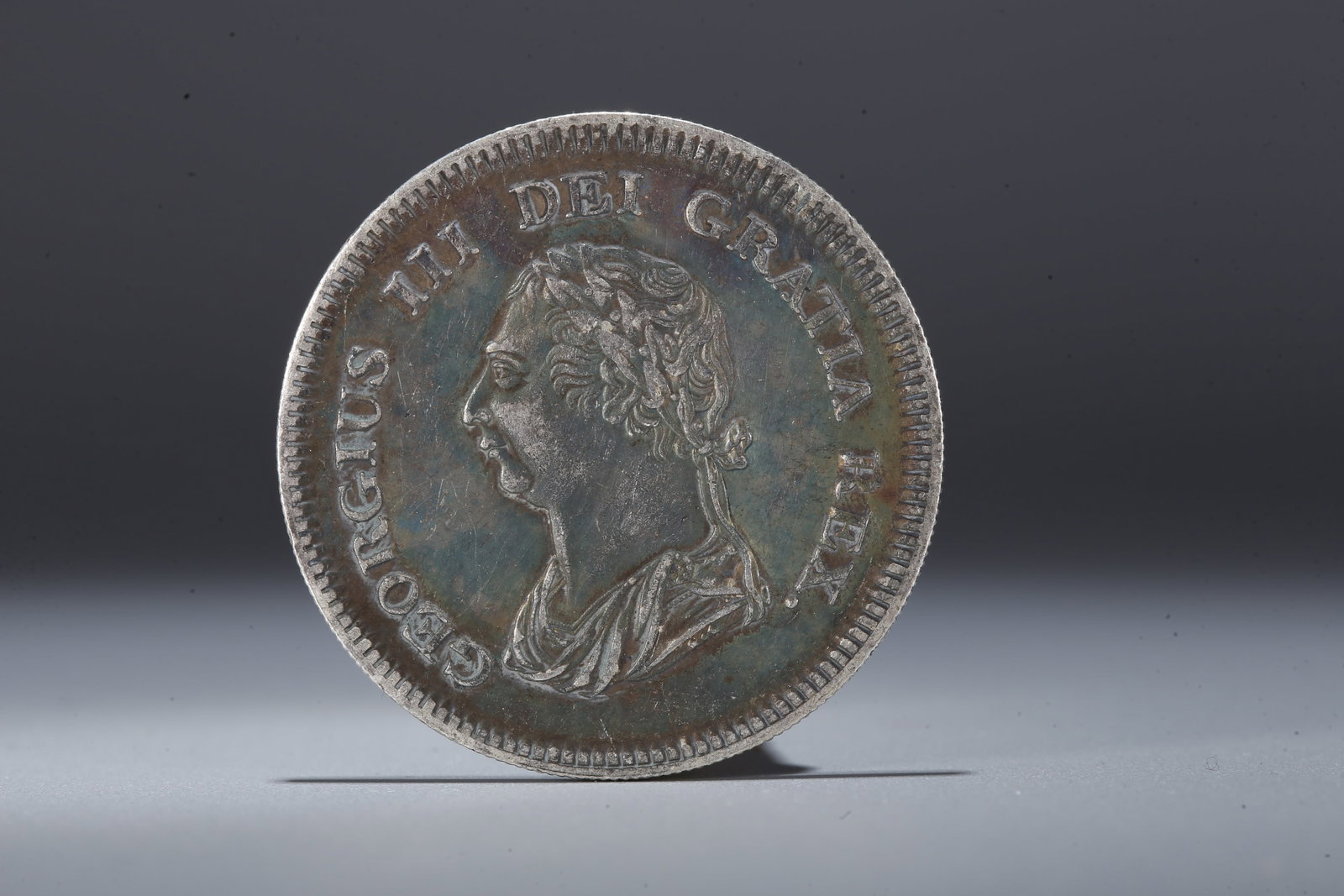 A SILVER DOLLAR COIN - 3