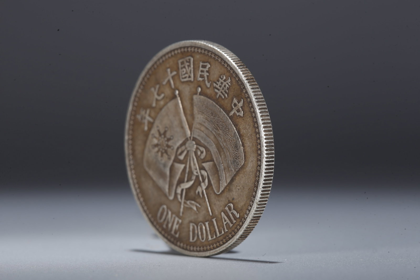 A SILVER DOLLAR COIN - 2
