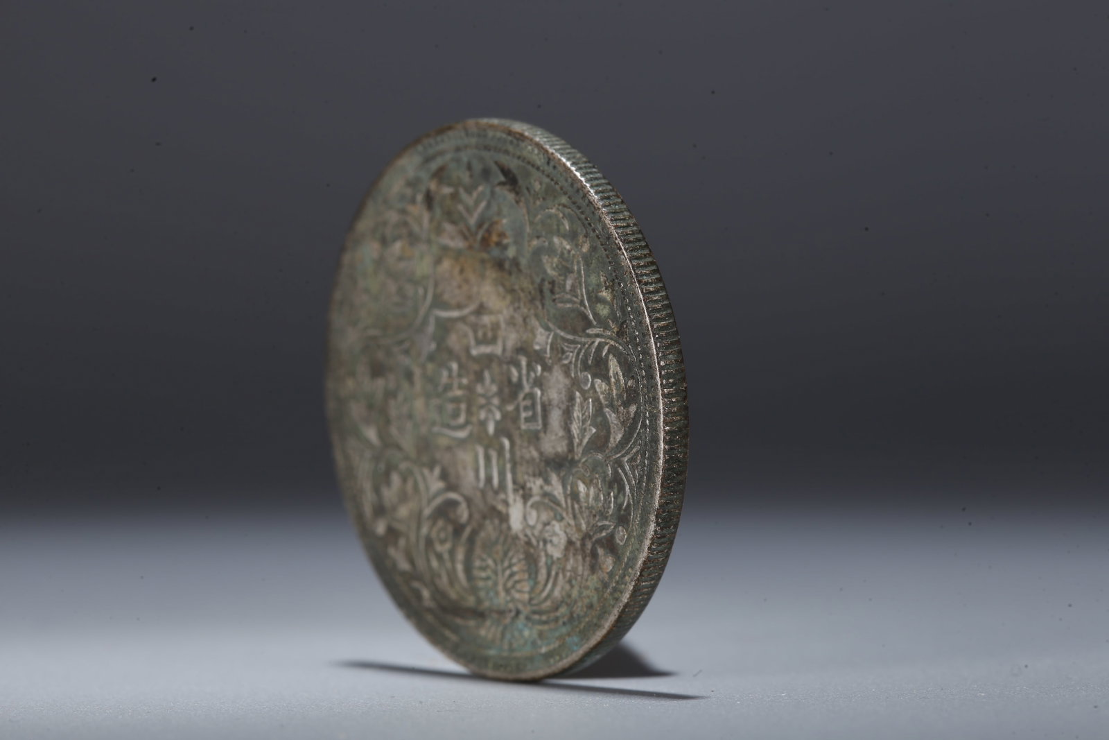A SILVER DOLLAR COIN - 2