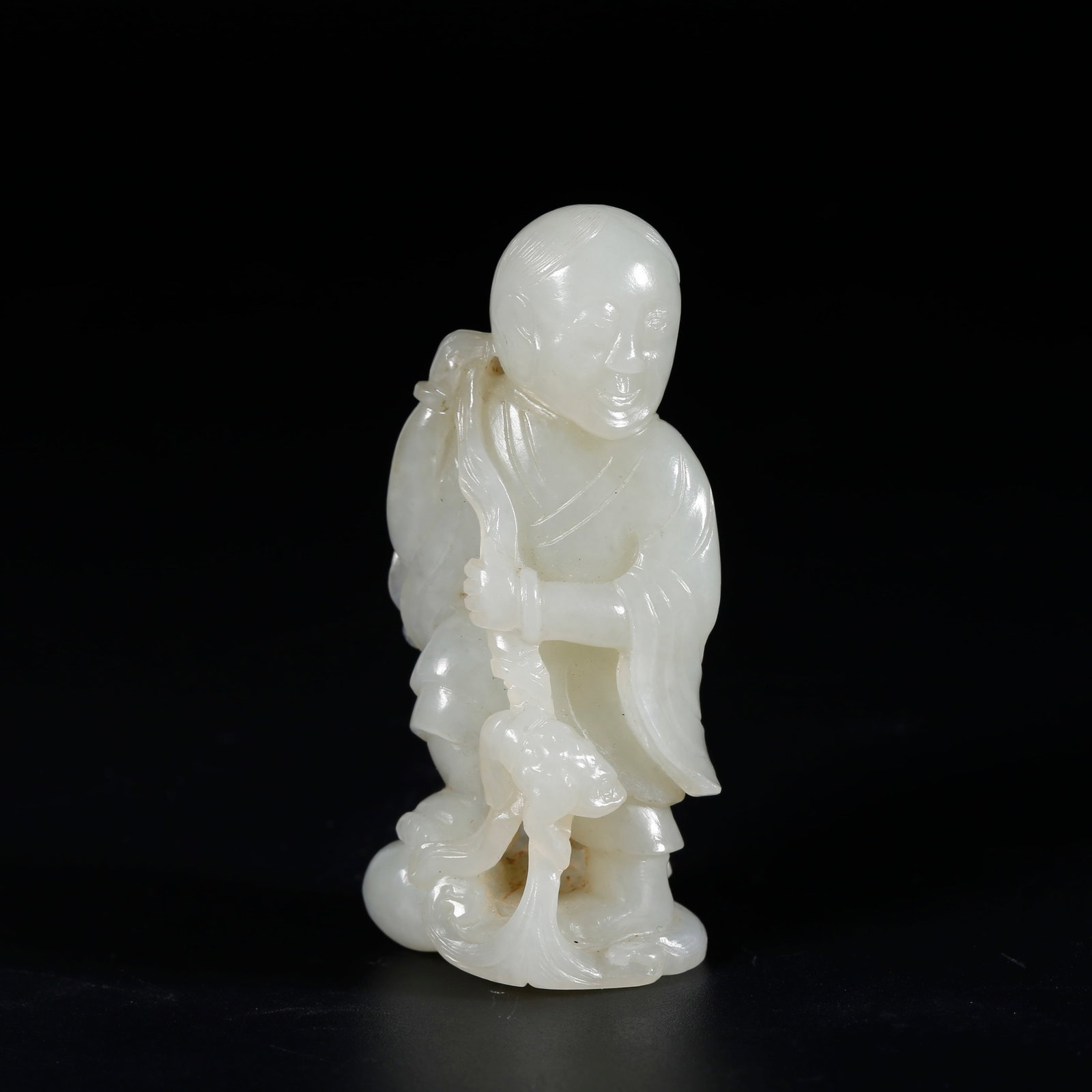 A HETIAN JADE ORNAMENT OF LIU HAI PLAYING WITH GOLDEN TOAD: Hetian Jade Ornament of Liu Hai Playing with Golden Toad