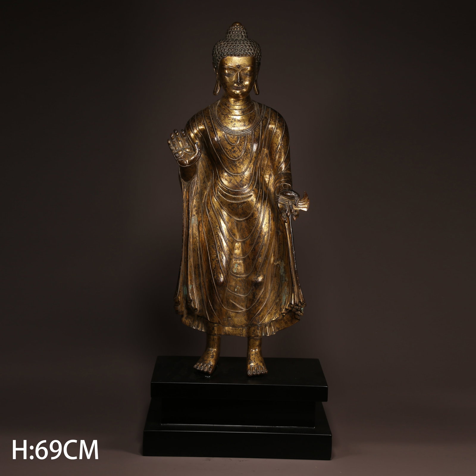 A GILT BRONZE STANDING SHAKYAMUNI BUDDHA STATUE: Gilt Bronze Standing Shakyamuni Buddha Statue