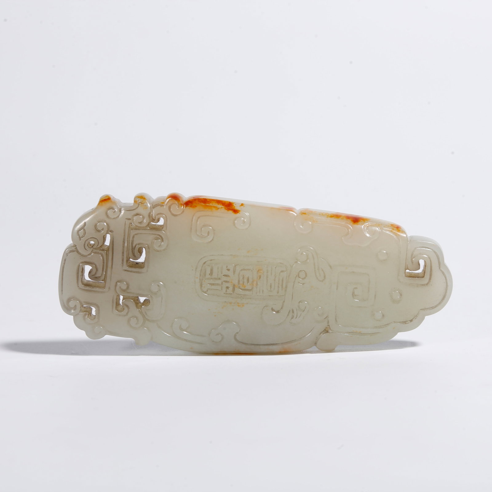 A HETIAN JADE PENDANT CARVED WITH PHOENIX MOTIFS (1 of 10)