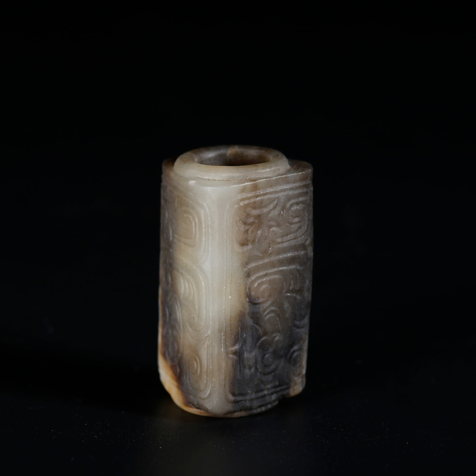 A ARCHAIC JADE LEZI TUBE CARVED WITH AUSPICIOUS CLOUD PATTERNS: Archaic Jade Lezi Tube Carved with Auspicious Cloud Patterns