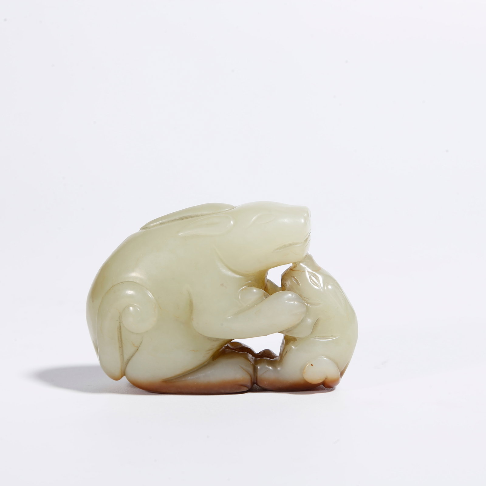A HETIAN JADE AUSPICIOUS BEAST ORNAMENT (1 of 8)