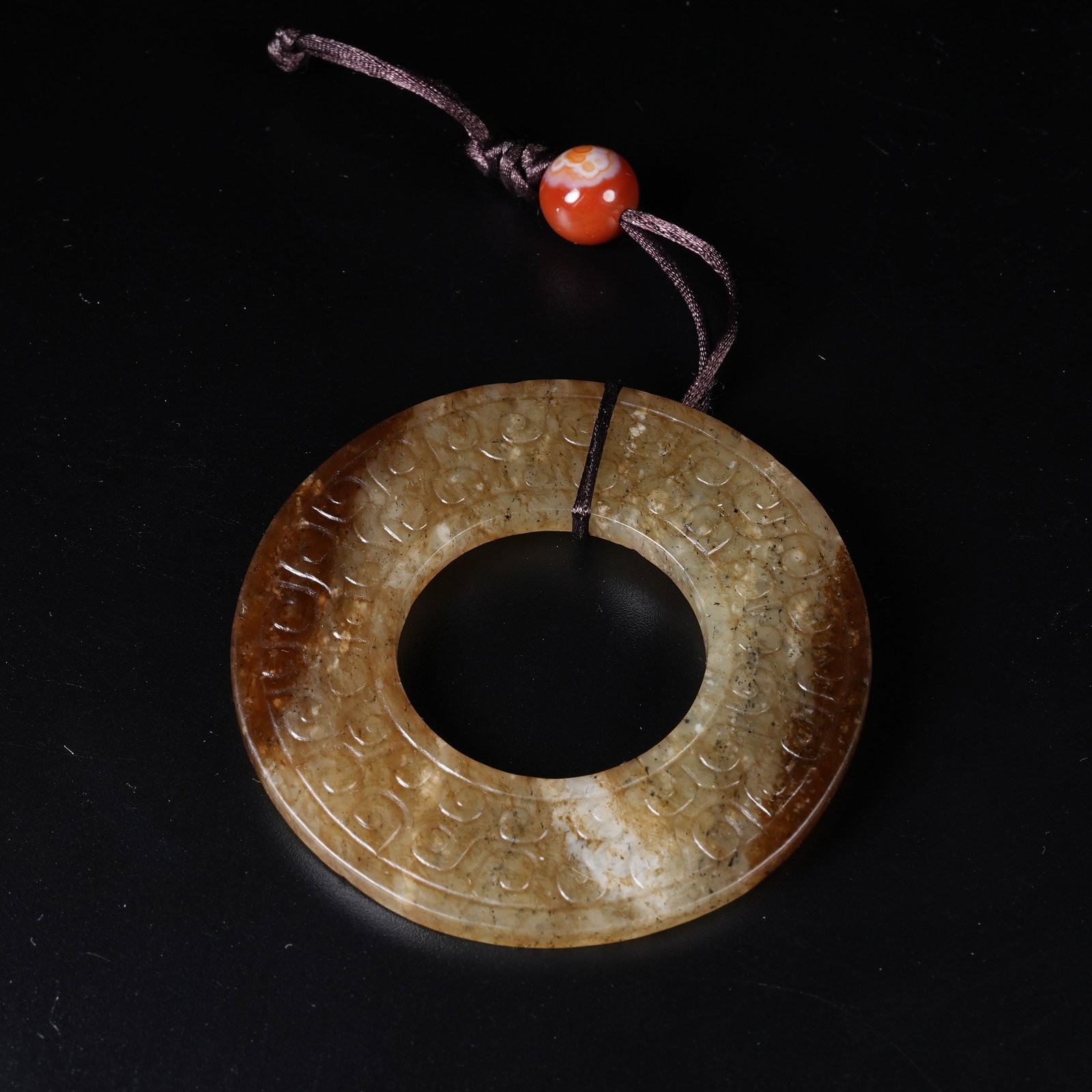 A ANCIENT JADE BI DISC WITH HOOKED CLOUD PATTERN - 10