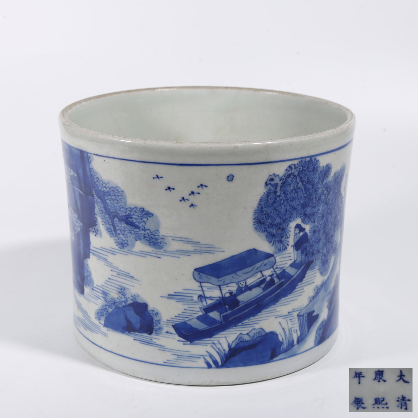 A BLUE AND WHITE BRUSH POT WITH LANDSCAPE AND FIGURE PATTERN: Blue and White Brush Pot with Landscape and Figure Pattern