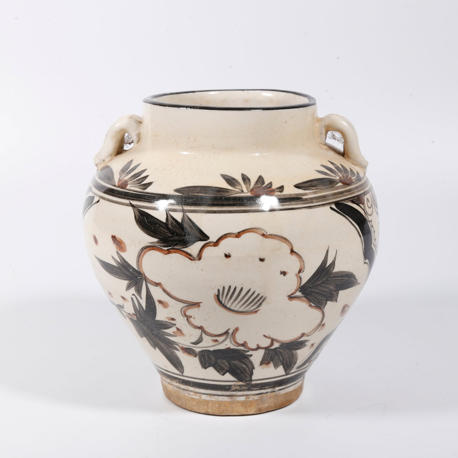 A JIZHOU KILN TWIN-LOOPED JAR WITH CRANE MOTIFS: Jizhou Kiln Twin-looped Jar with Crane Motifs