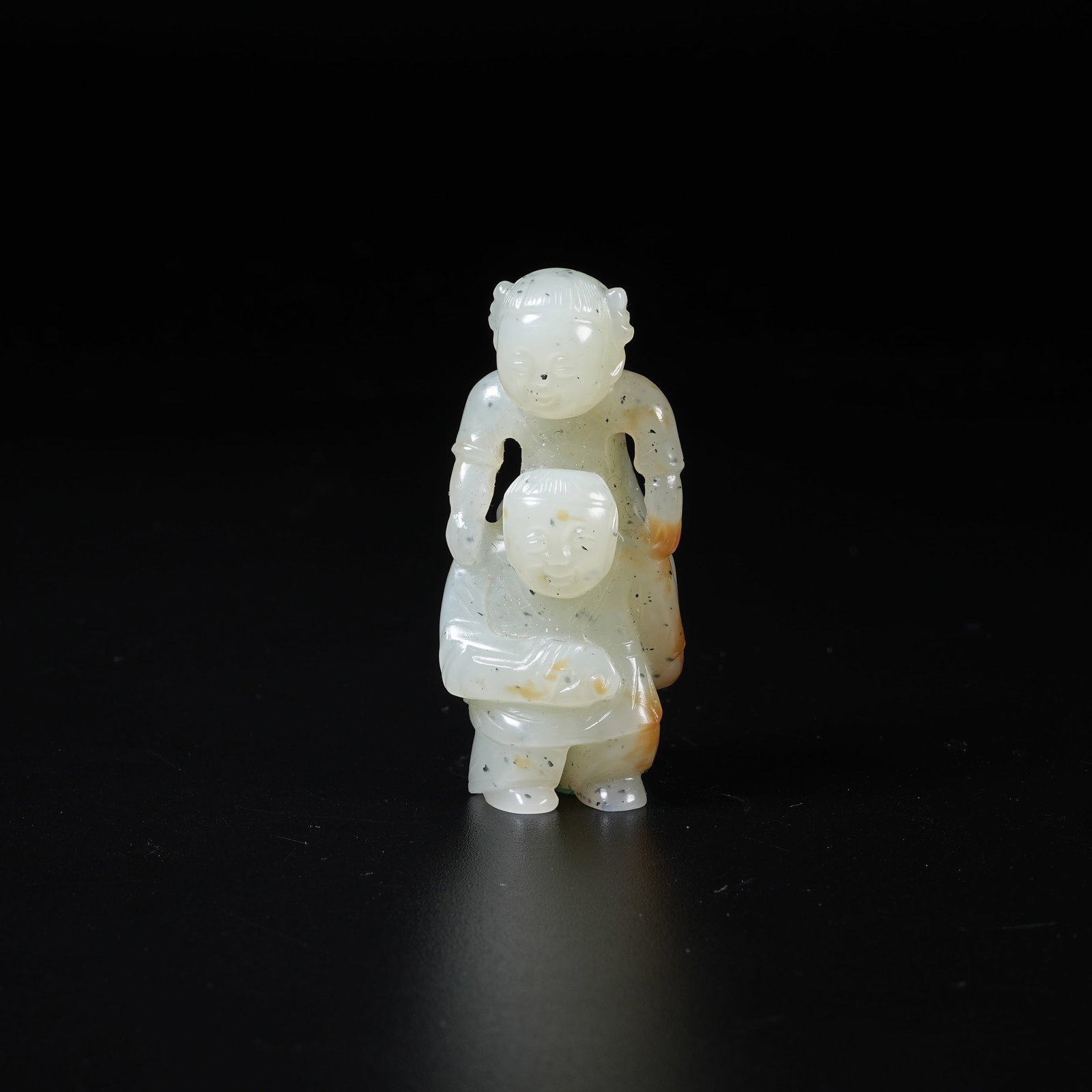 A HETIAN JADE BOY FIGURE PENDANT (1 of 8)