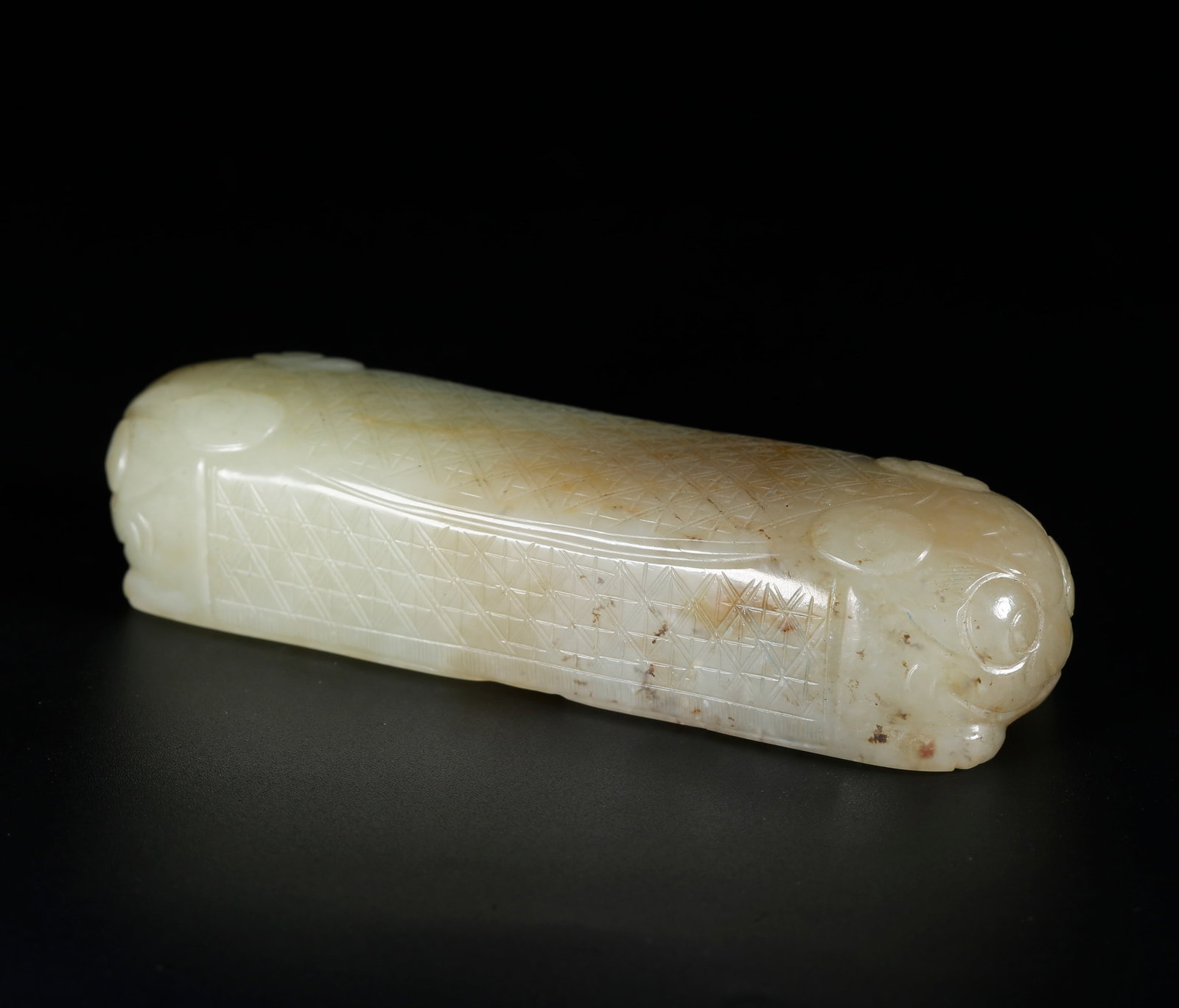 A HETIAN JADE BEAST-SHAPED PAPERWEIGHT (1 of 8)