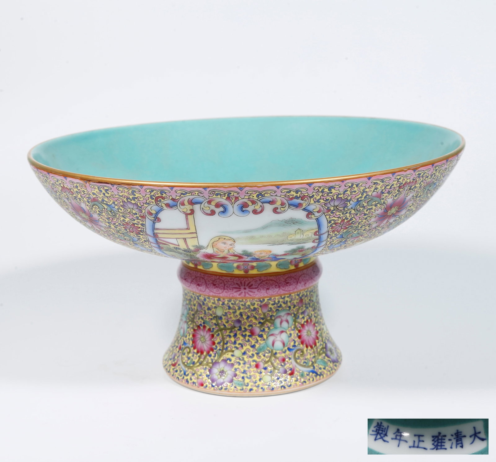 A YELLOW GROUND FAMILLE ROSE STEM BOWL WITH FLOWER, BIRD AND FIGURE PANELS: Yellow Ground Famille Rose Stem Bowl with Flower, Bird and Figure Panels