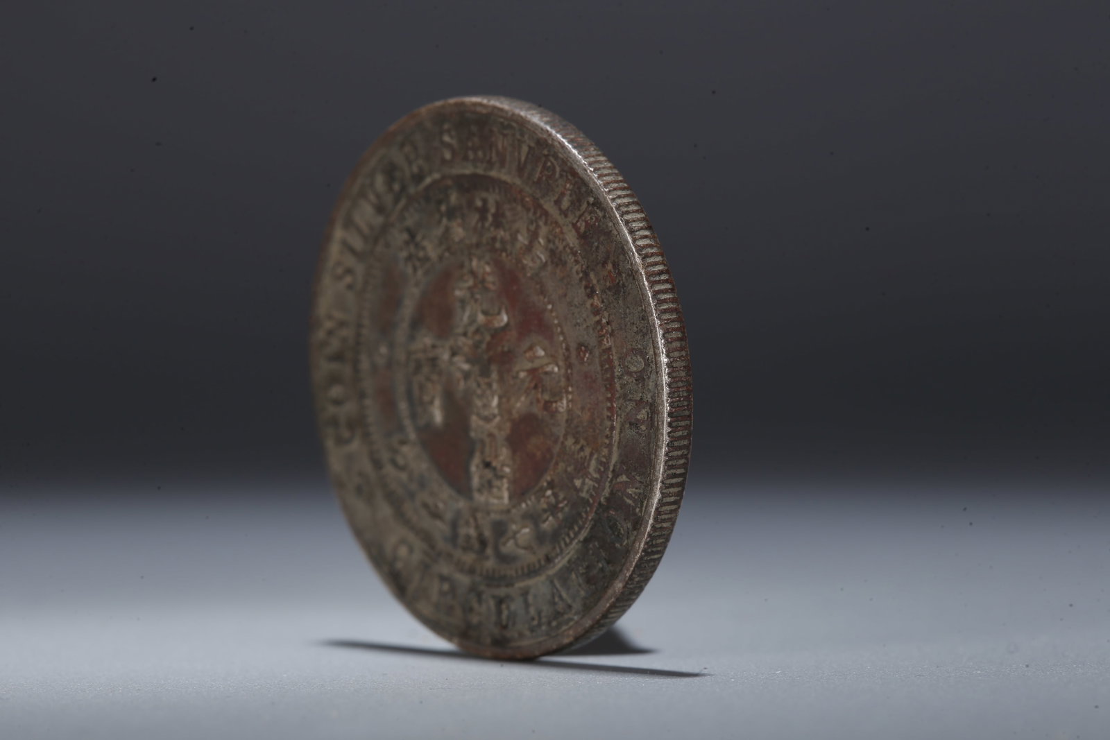 A SILVER DOLLAR COIN - 2