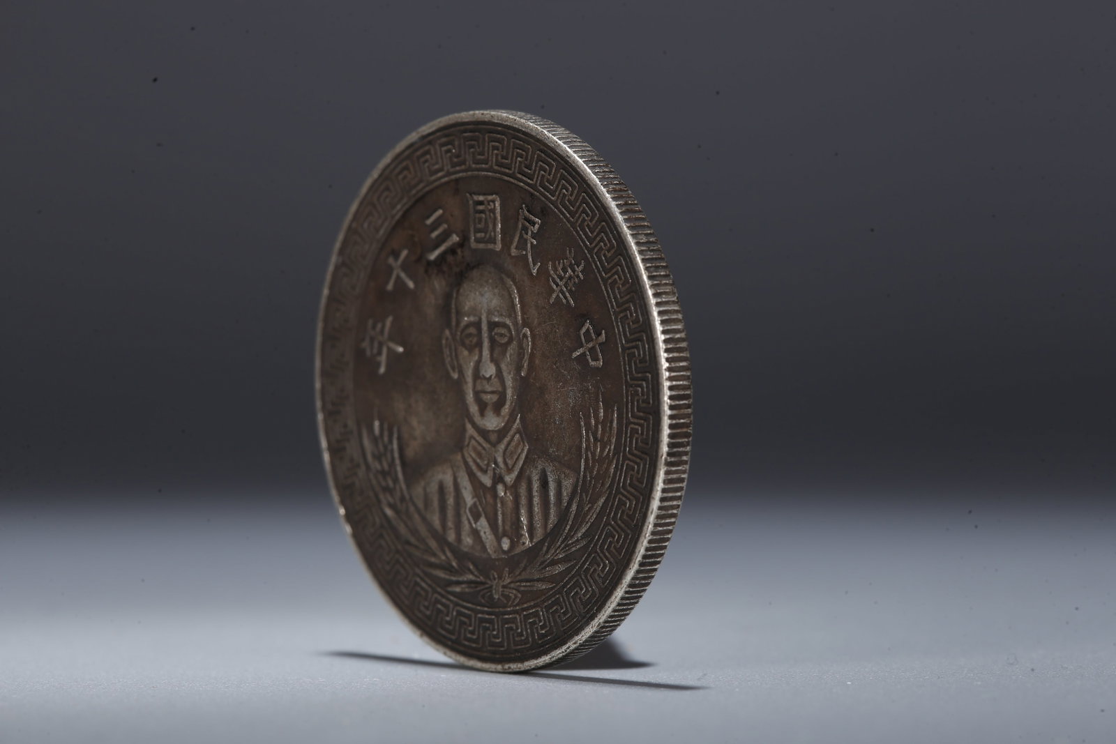 A SILVER DOLLAR COIN - 2