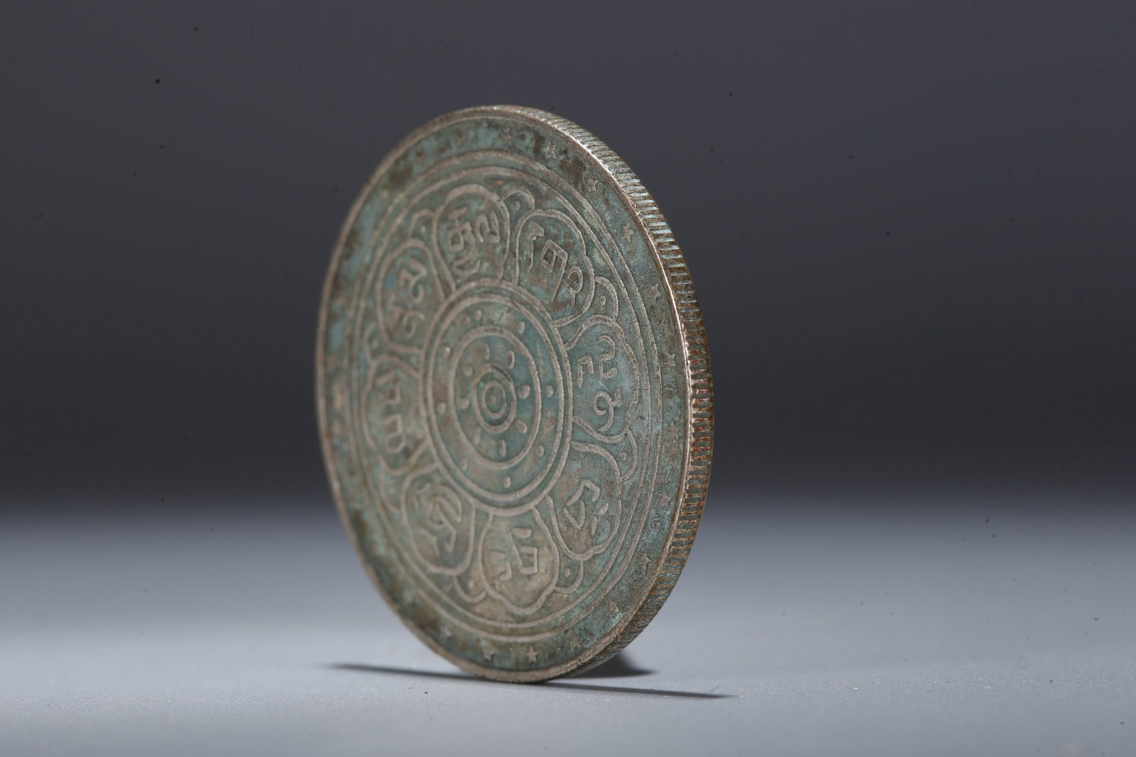 A SILVER DOLLAR COIN - 2
