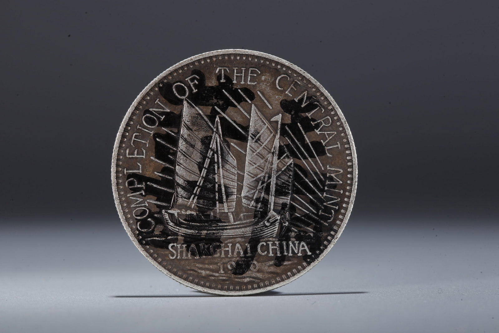 A SILVER DOLLAR COIN - 3