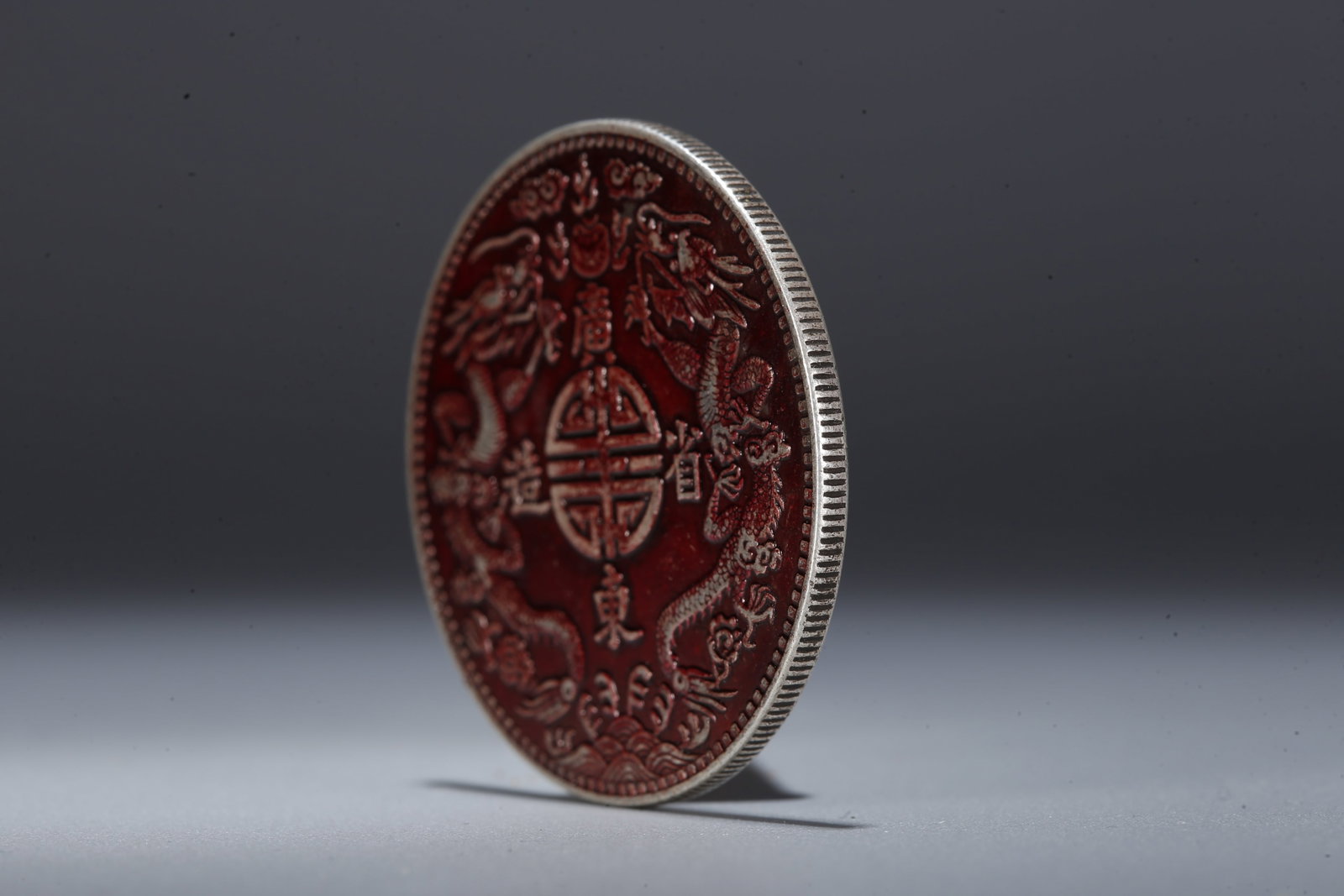 A SILVER DOLLAR COIN - 2