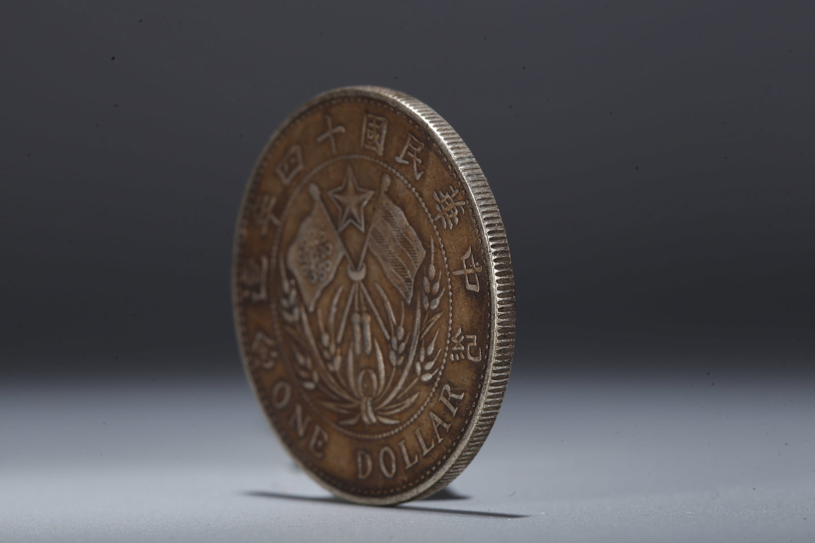 A SILVER DOLLAR COIN - 2