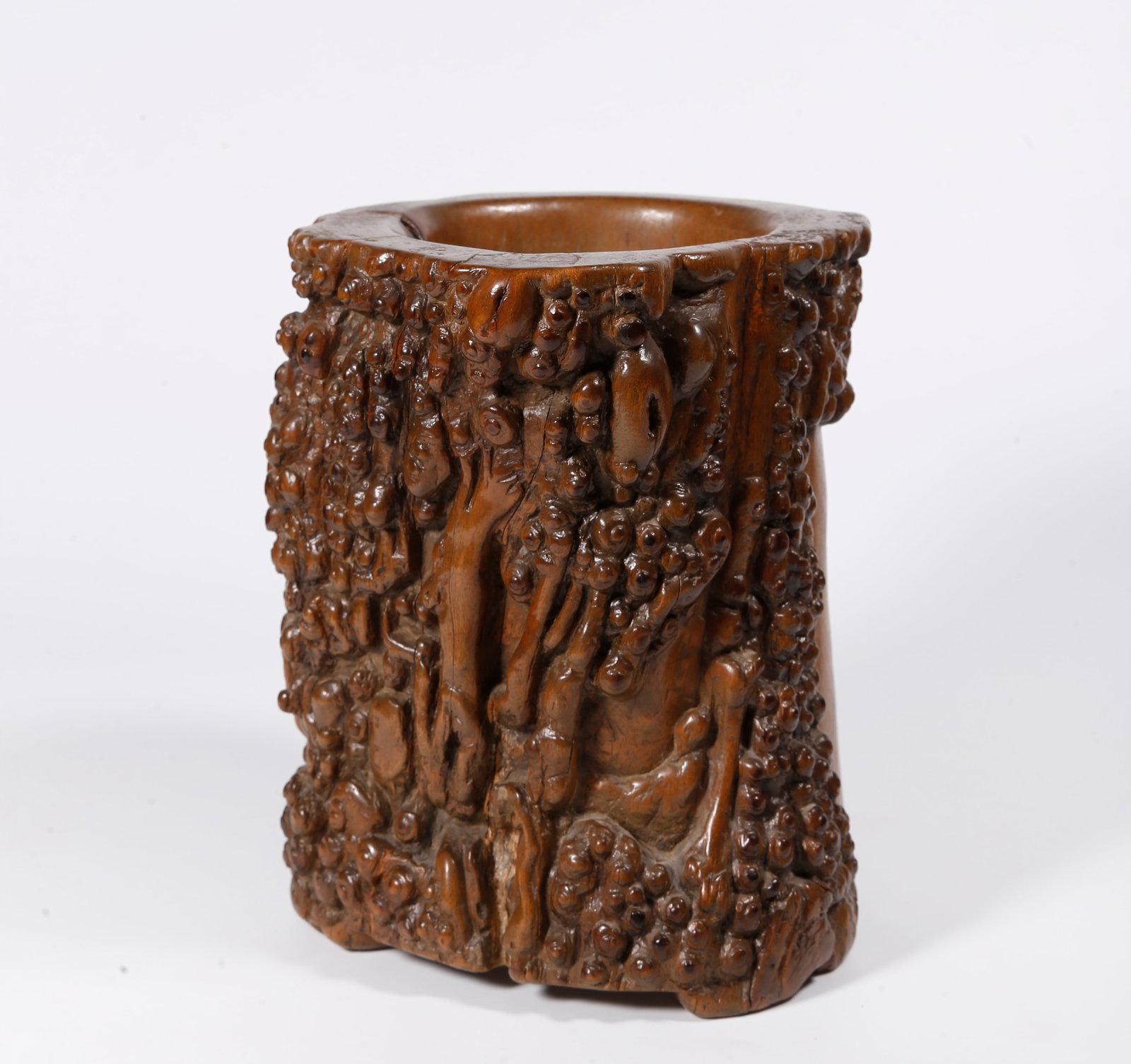 A HUANGHUALI WOOD BURL CARVED BRUSH POT: Huanghuali Wood Burl Carved Brush Pot