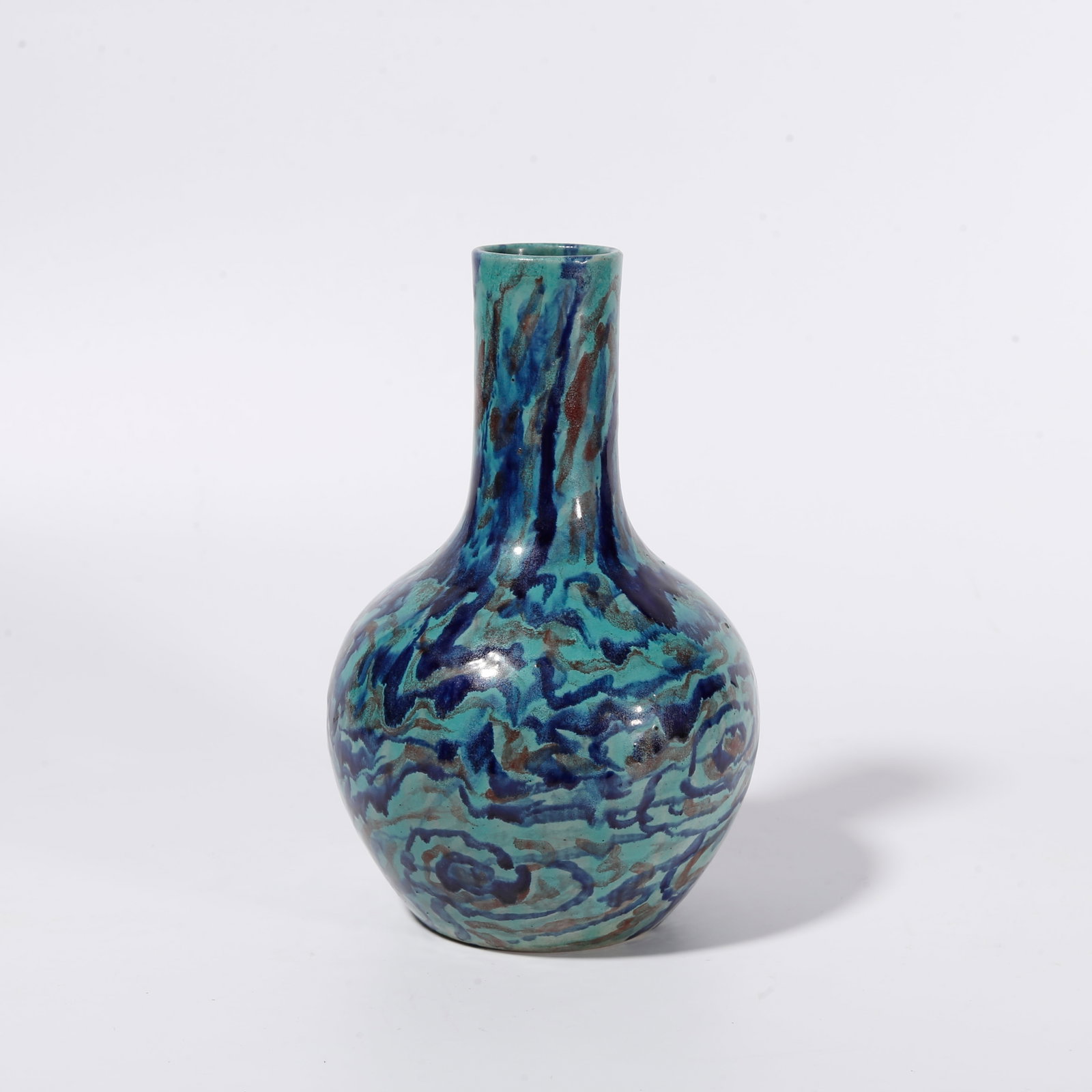 A MARBLED CLAY GLOBULAR VASE: Marbled Clay Globular Vase