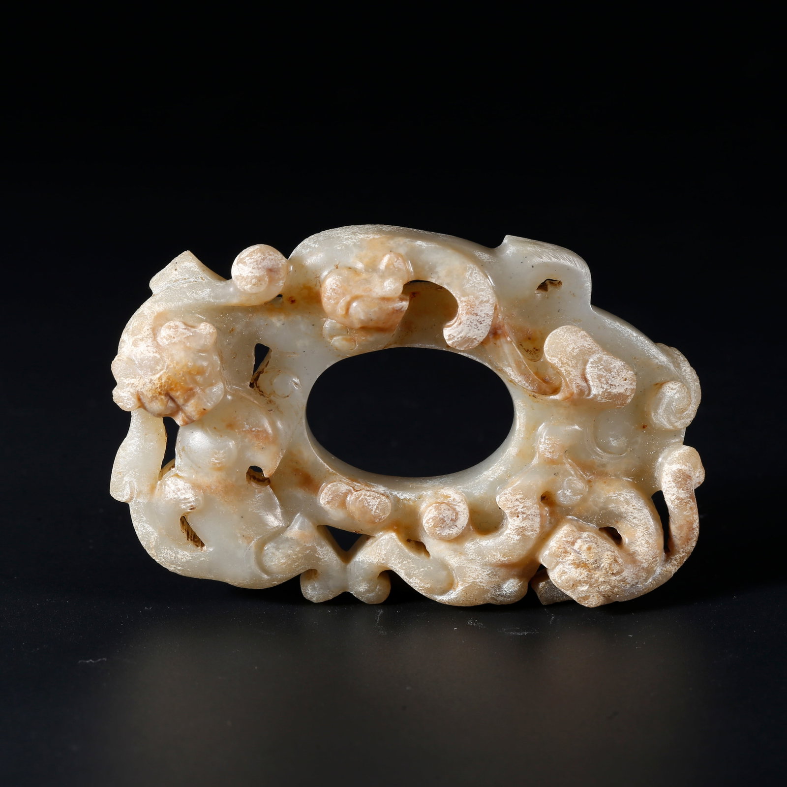 A ARCHAIC JADE HEART-SHAPED PENDANT WITH DRAGON MOTIFS: Archaic Jade Heart-shaped Pendant with Dragon Motifs