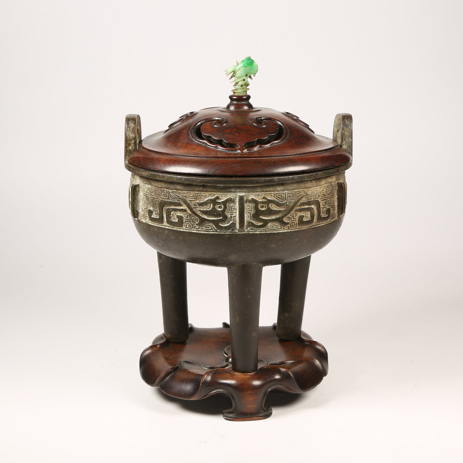 A BRONZE CENSER WITH AUSPICIOUS BEAST MOTIFS AND UPRIGHT FINIALS, THREE LEGS: Bronze Censer with Auspicious Beast Motifs and Upright Finials, Three Legs