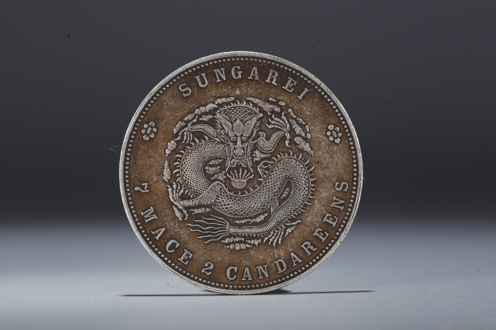 A SILVER DOLLAR COIN - 3