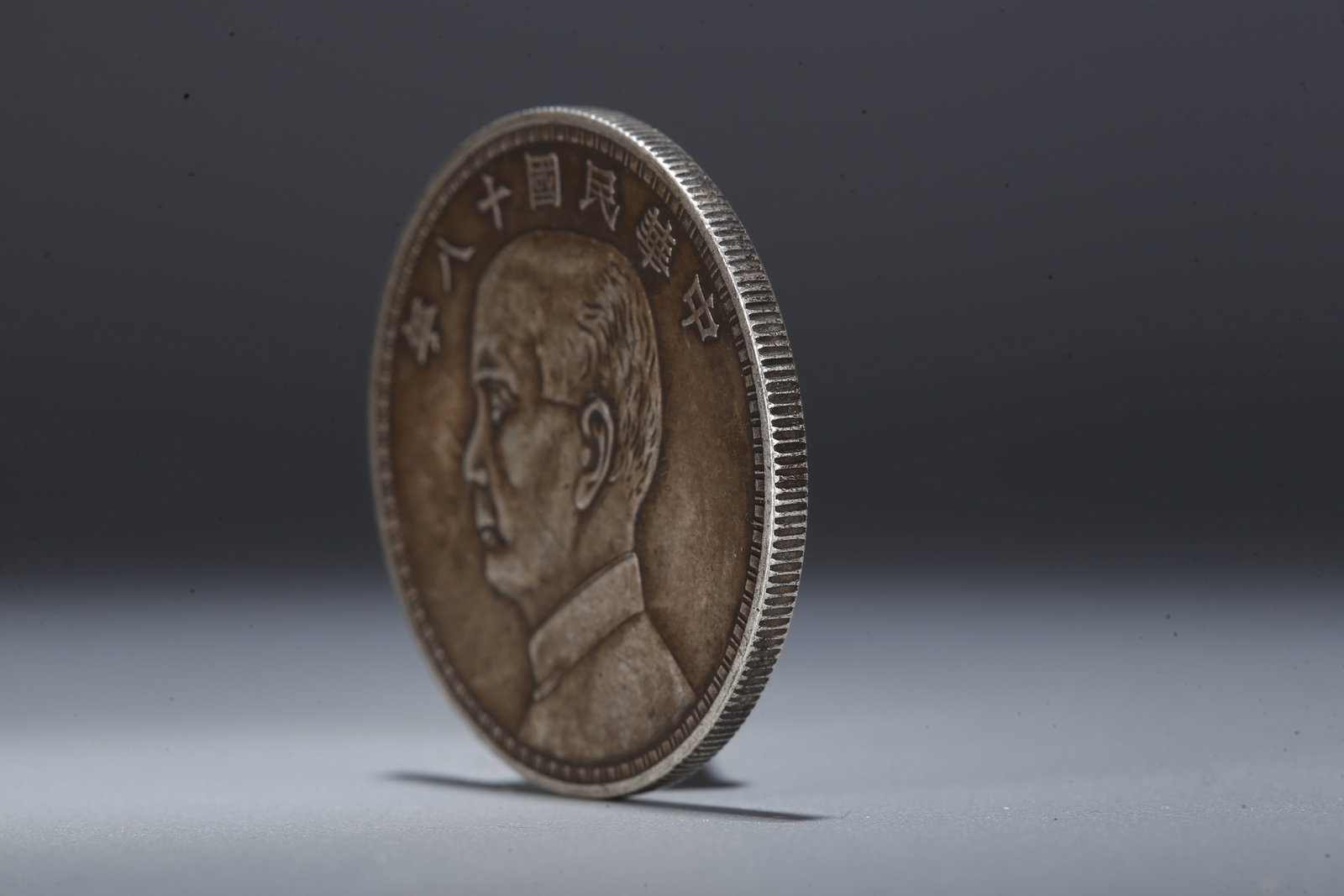 A SILVER DOLLAR COIN - 2