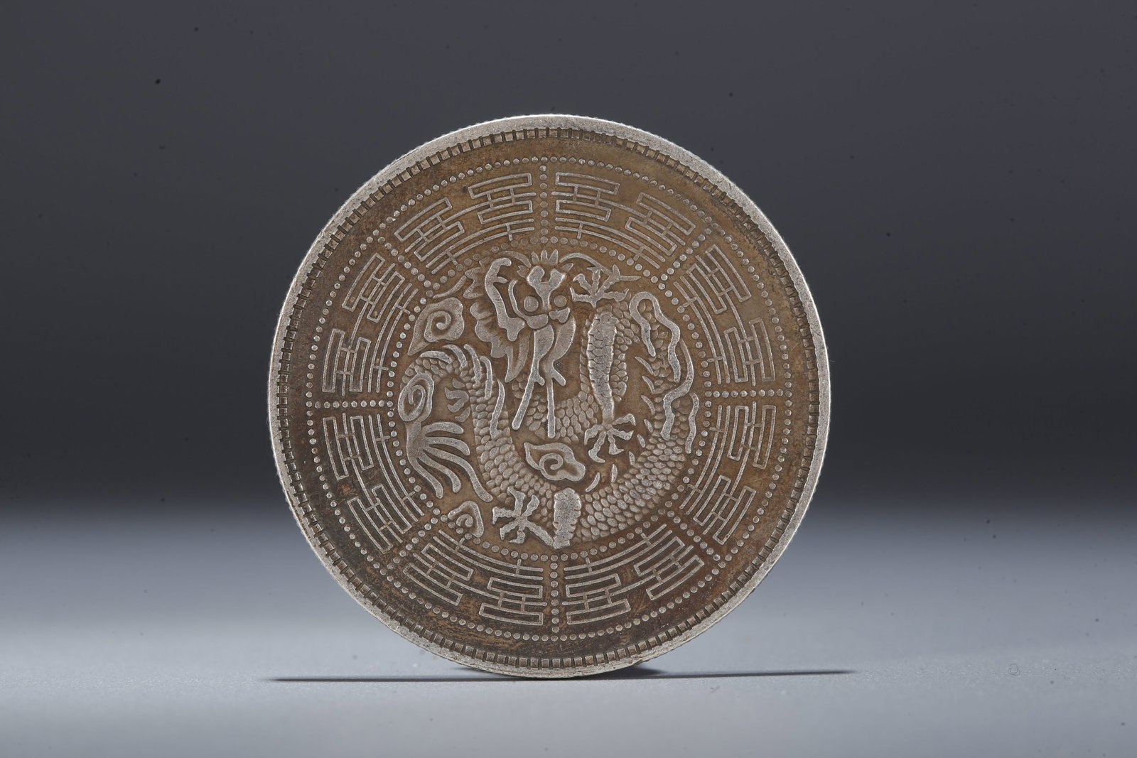 A SILVER DOLLAR COIN - 3