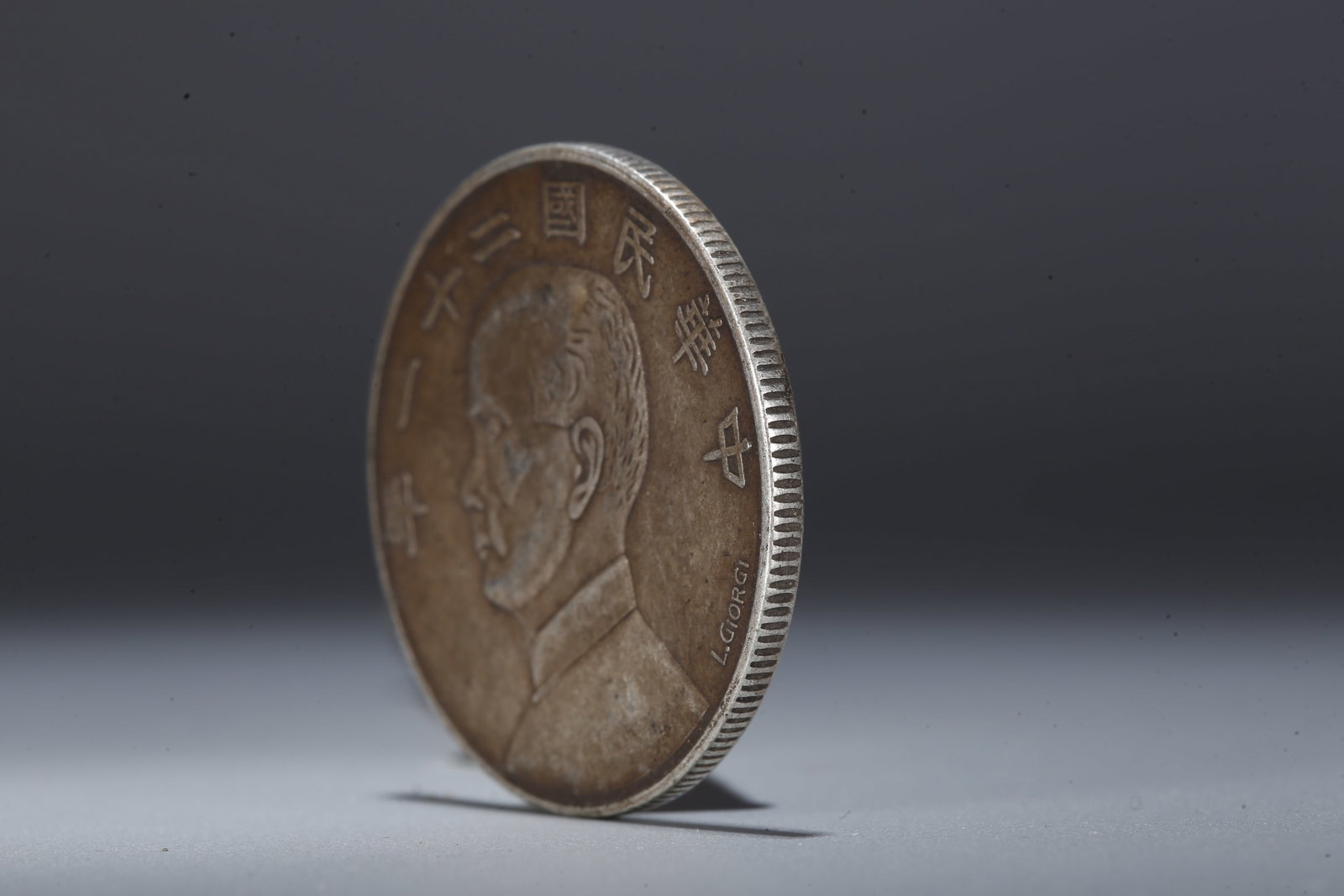 A SILVER DOLLAR COIN - 2