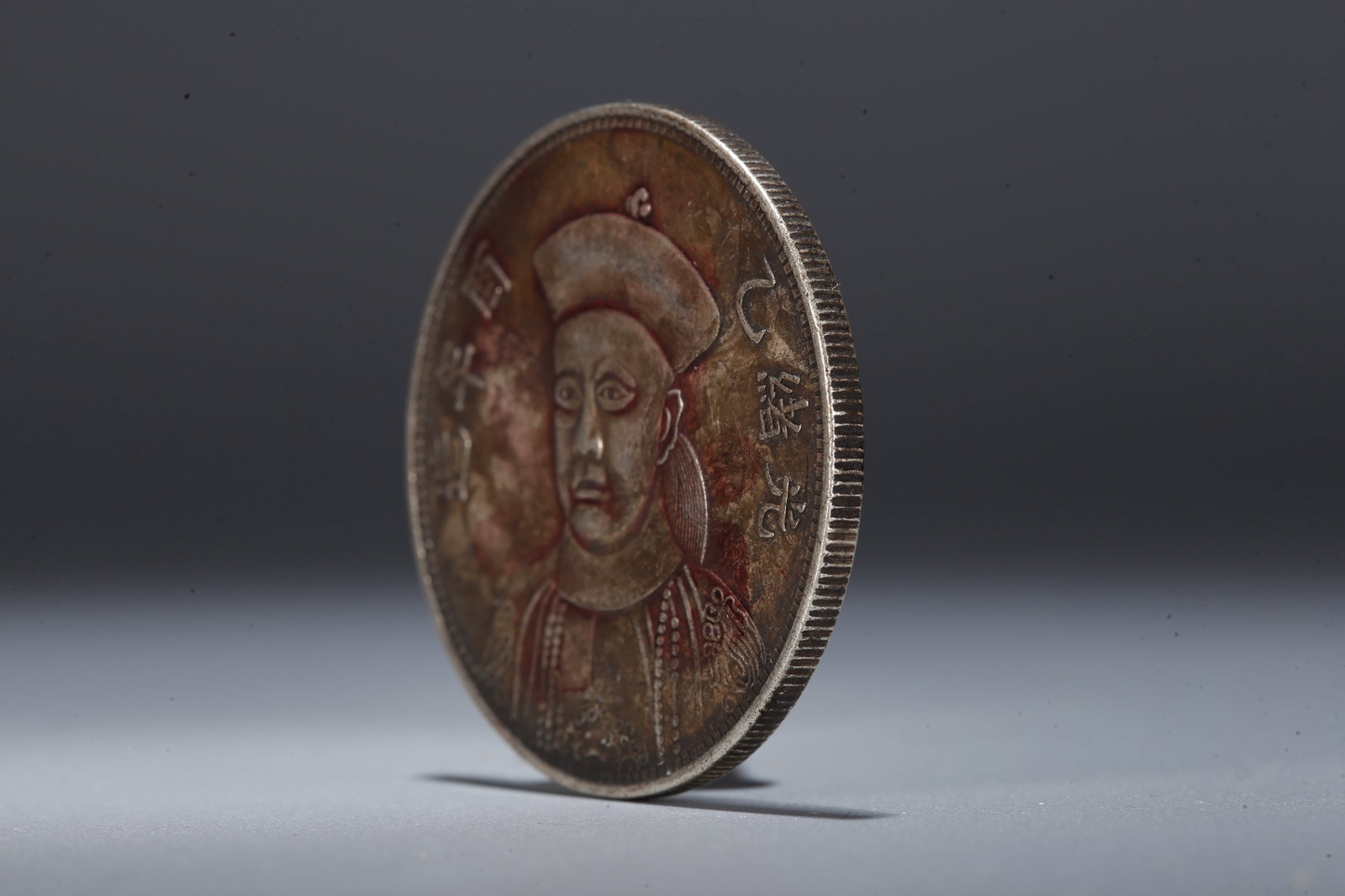 A SILVER DOLLAR COIN - 2