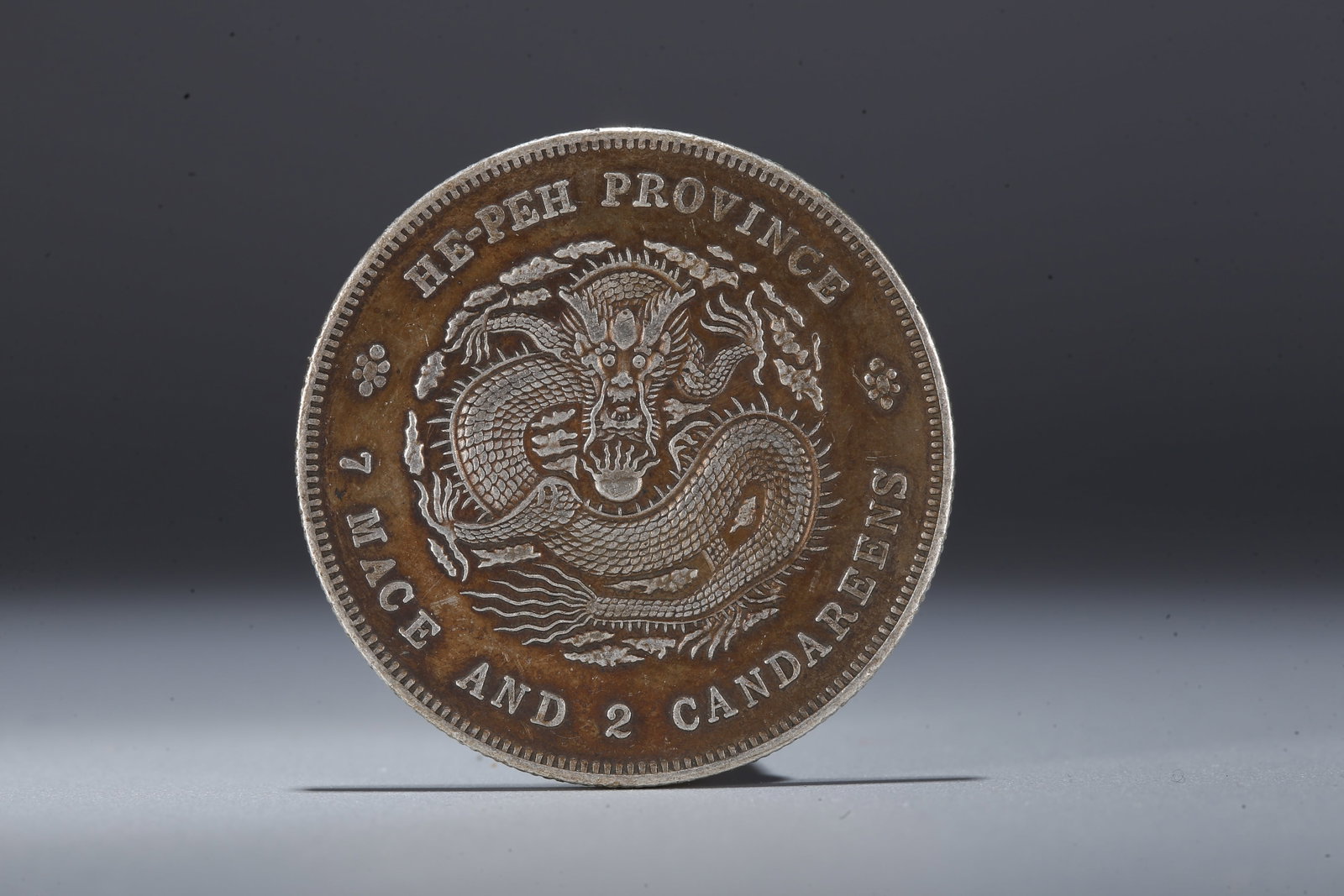 A SILVER DOLLAR COIN - 3