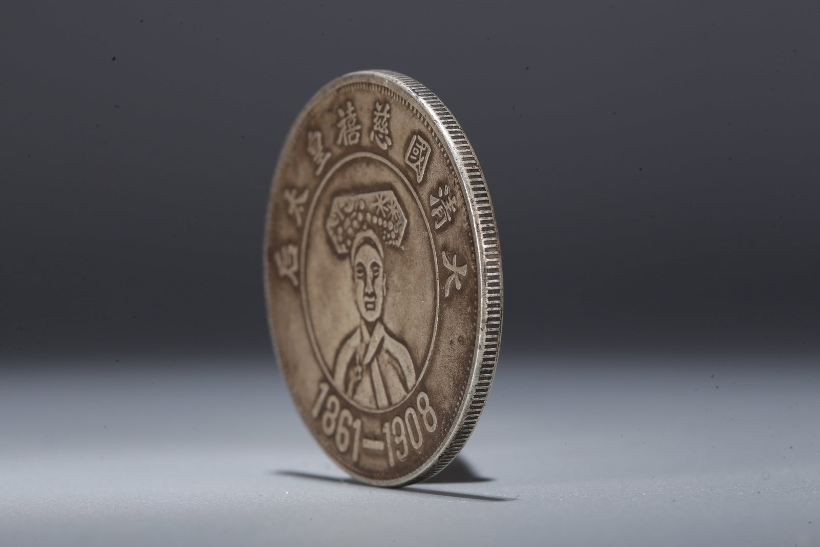 A SILVER DOLLAR COIN - 2