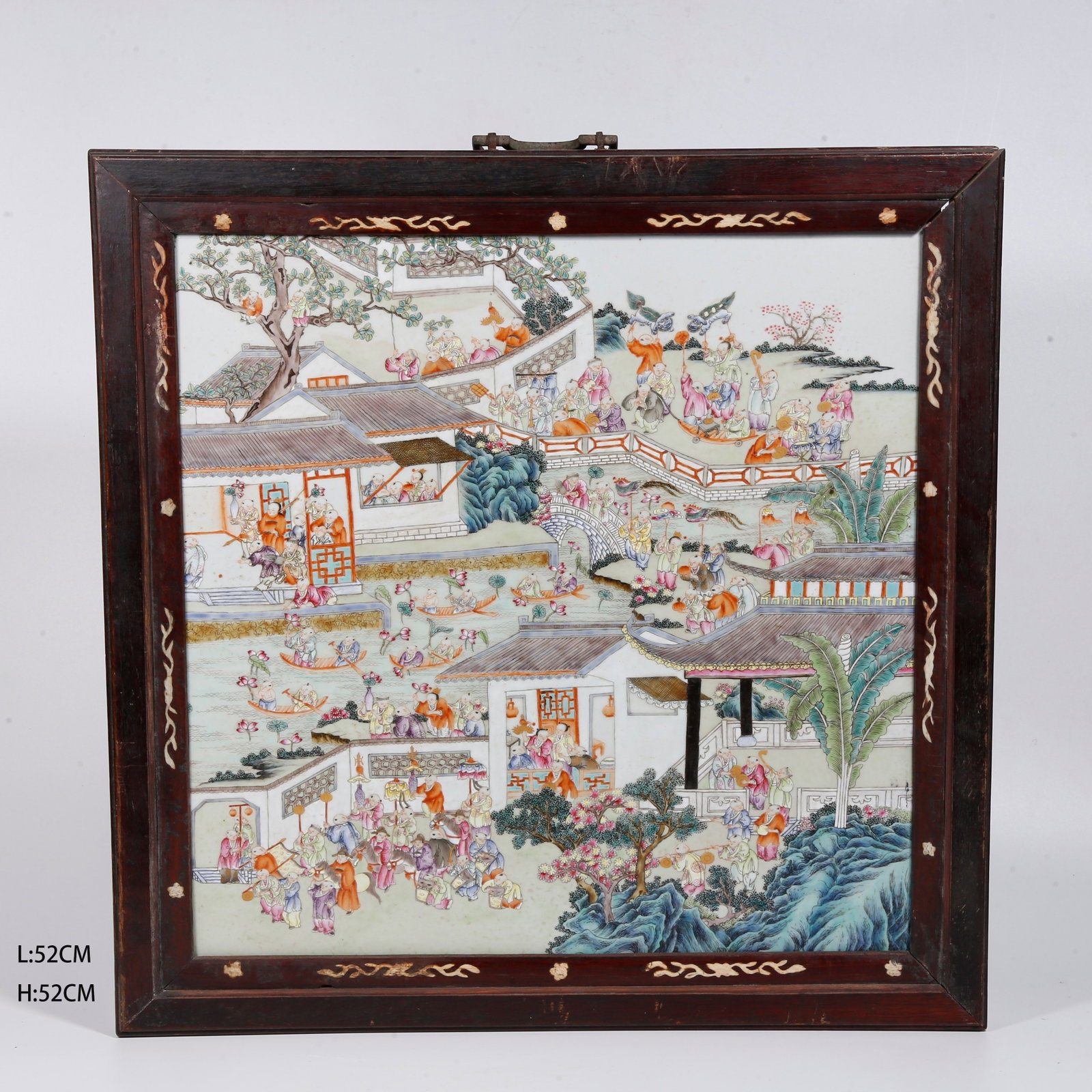 A REDWOOD HANGING SCREEN INLAID WITH FAMILLE ROSE PORCELAIN PLAQUE DEPICTING HUNDRED BOYS AT PLAY: Redwood Hanging Screen Inlaid with Famille Rose Porcelain Plaque Depicting Hundred Boys at Play