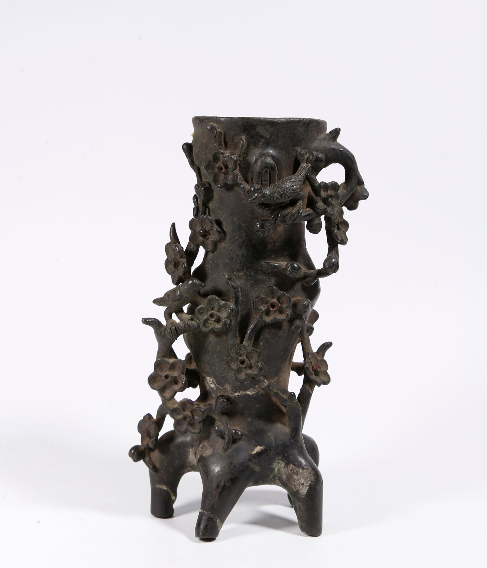 A BRONZE BRUSH POT WITH FLOWER AND BIRD PATTERN: Bronze Brush Pot with Flower and Bird Pattern