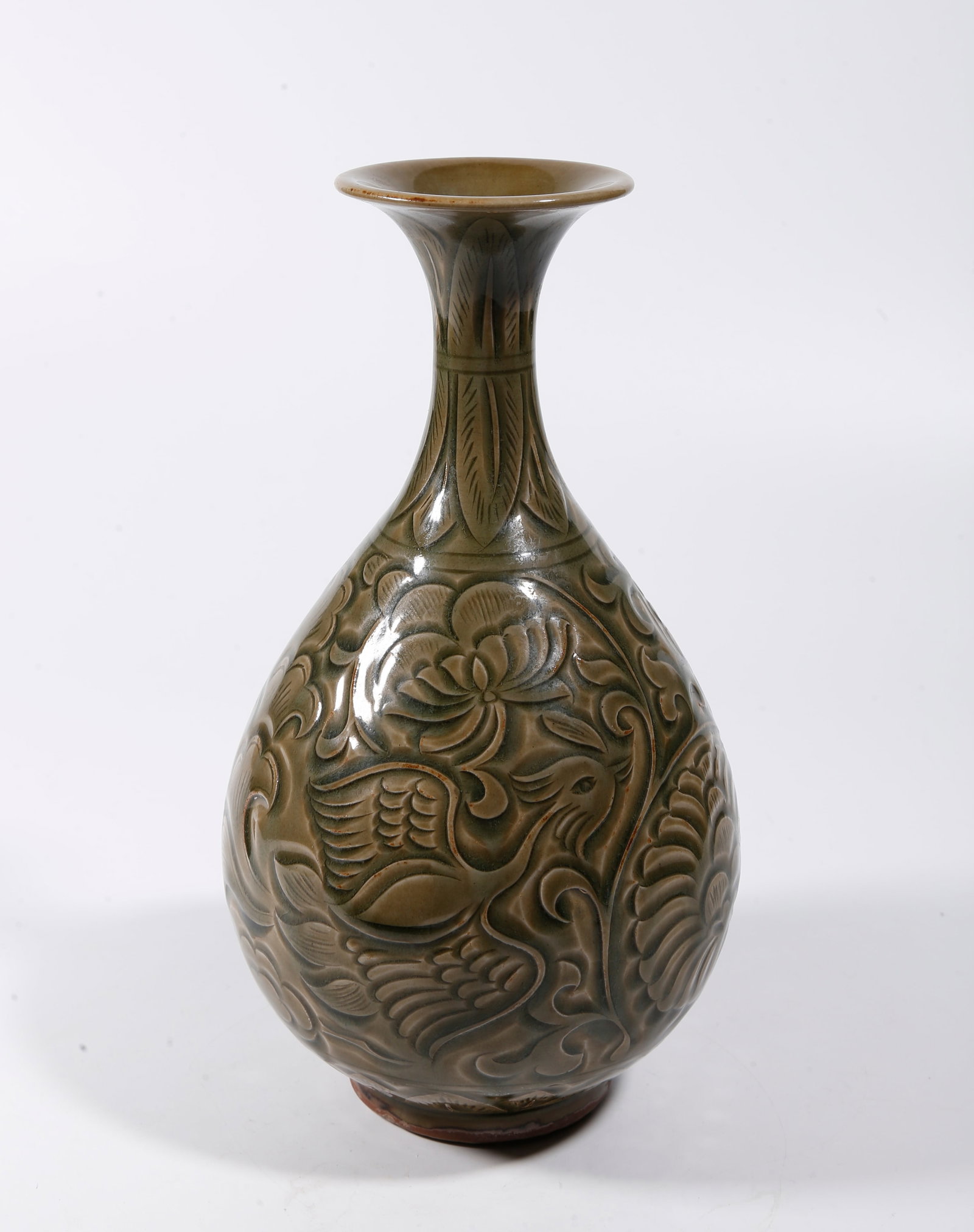 A YAOZHOU KILN PEAR-SHAPED VASE WITH INTERTWINED FLORAL PHOENIX MOTIFS: Yaozhou Kiln Pear-shaped Vase with Intertwined Floral Phoenix Motifs