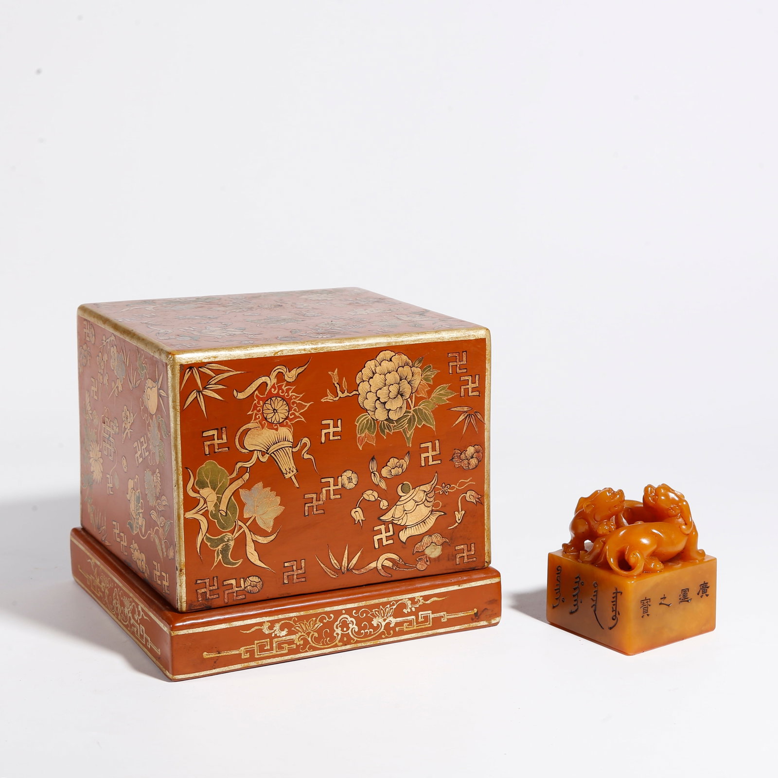 A SHOUSHAN TIANHUANG STONE SEAL CARVED WITH LION AND CUB LION KNOB: Shoushan Tianhuang Stone Seal Carved with Lion and Cub Lion Knob