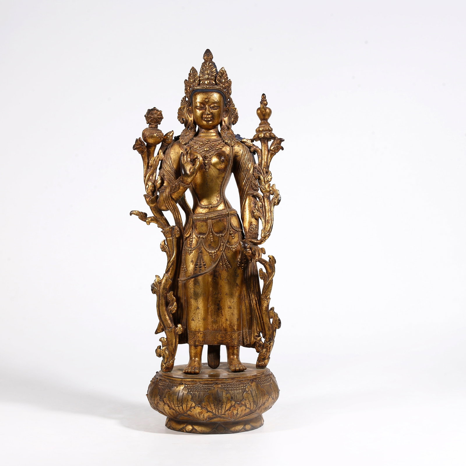 A GILT BRONZE STANDING BUDDHA STATUE (1 of 9)