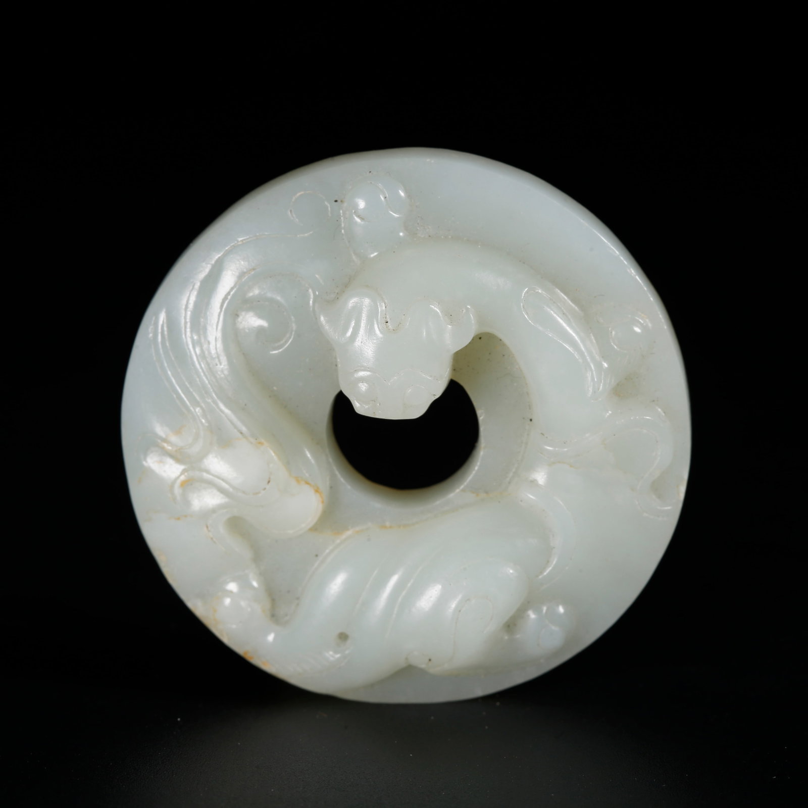A HETIAN JADE BI DISC CARVED WITH DRAGON PATTERNS (1 of 10)