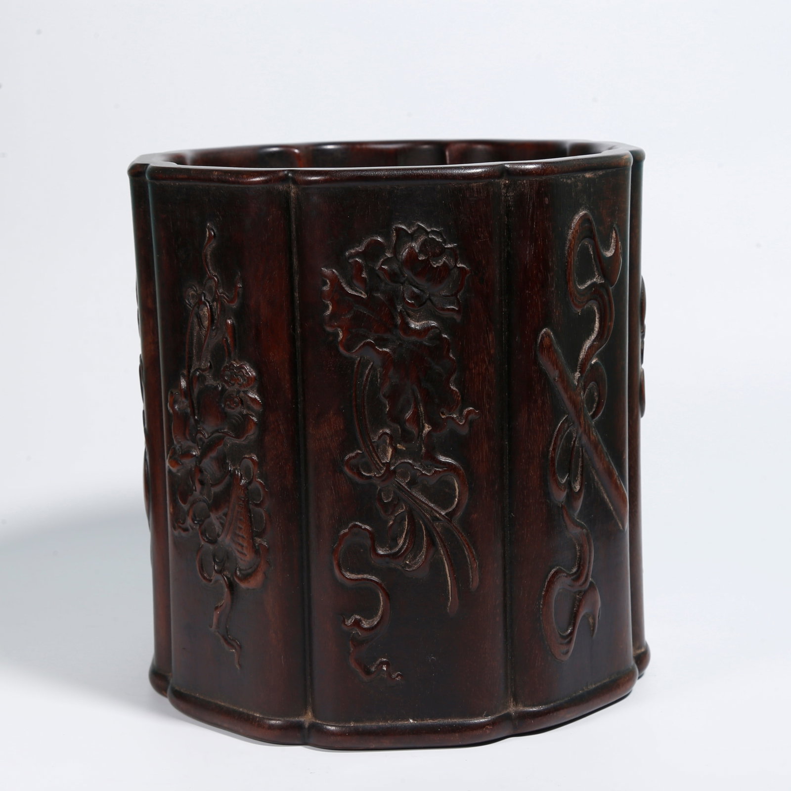 A RED SANDALWOOD BRUSH POT CARVED WITH EIGHT TREASURES MOTIFS (1 of 10)